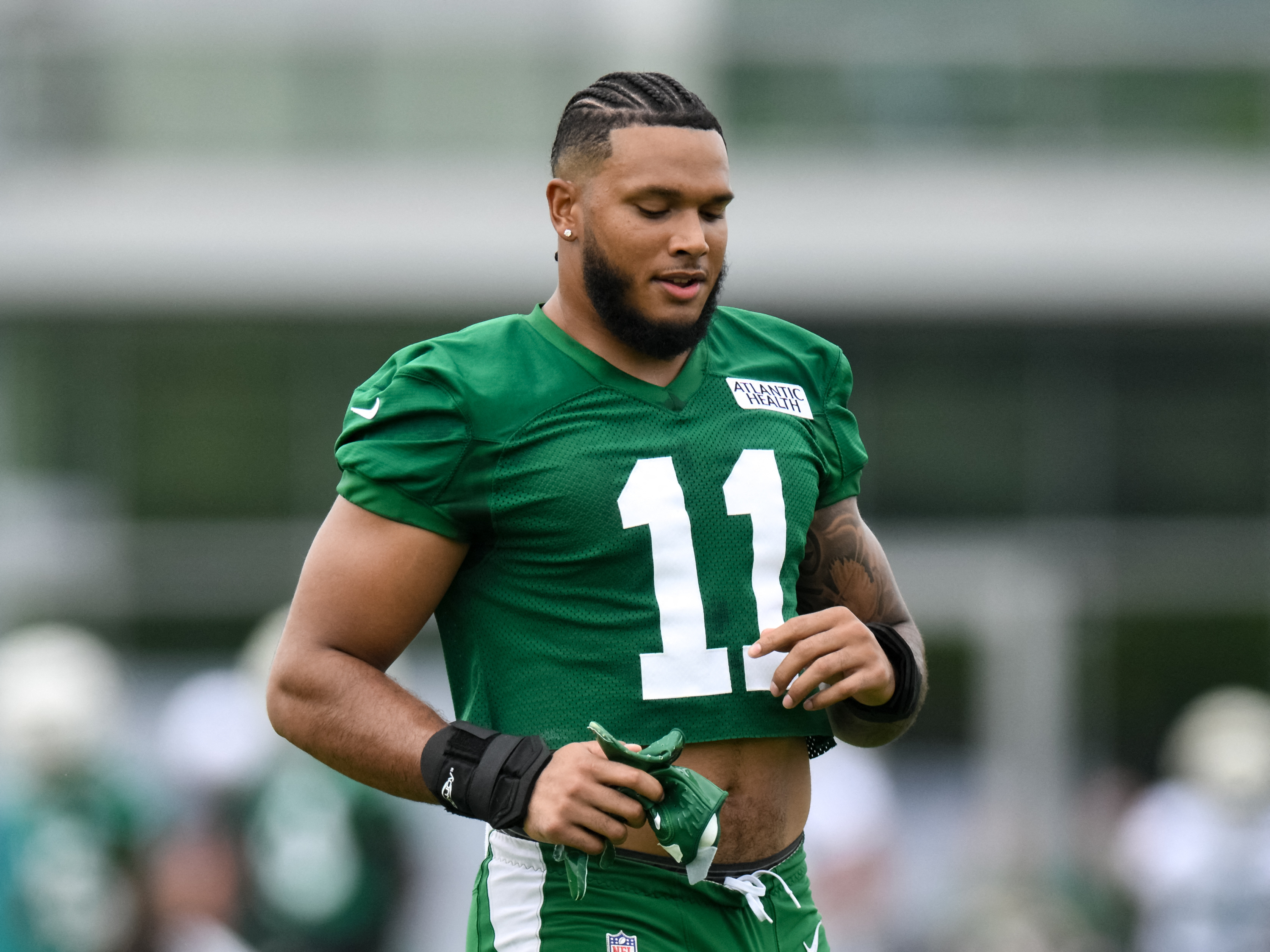 Jets DE Jermaine Johnson confirms torn Achilles, done for year | Reuters