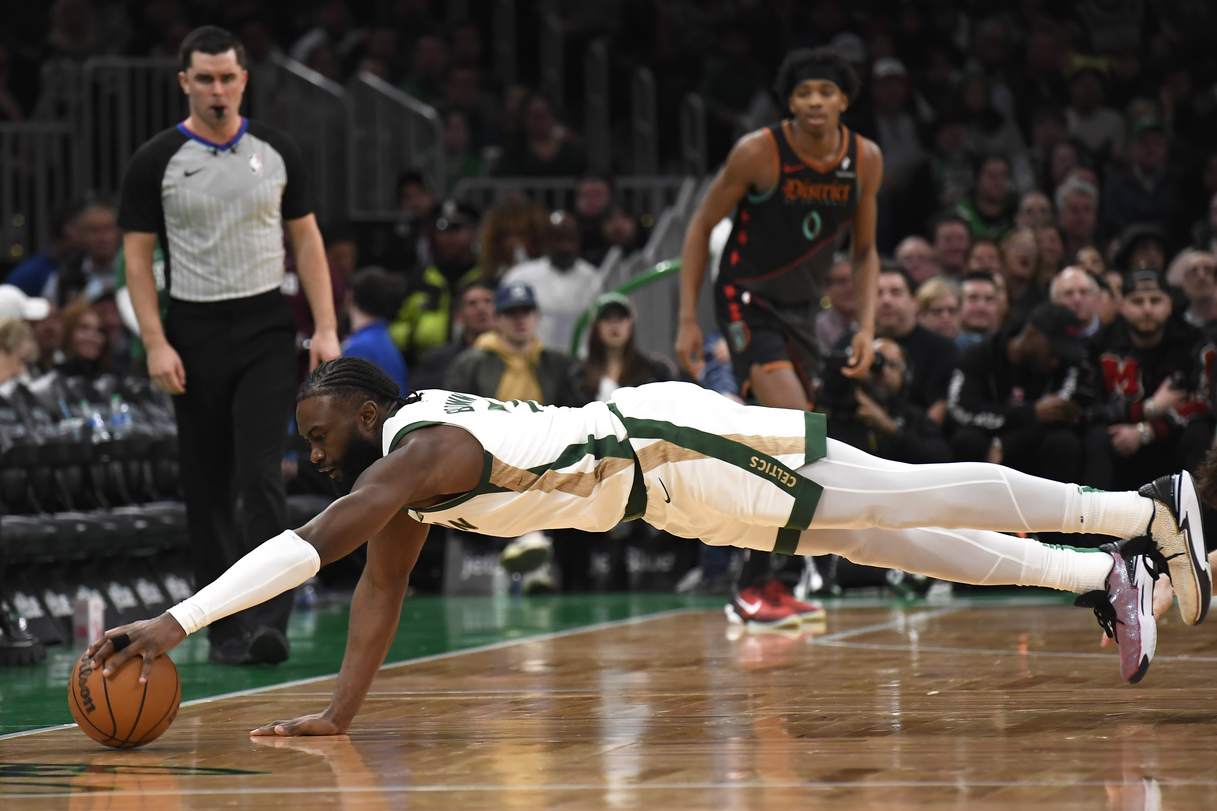 Jayson Tatum, Kristaps Porzingis Carry Celtics Past Wizards | Reuters