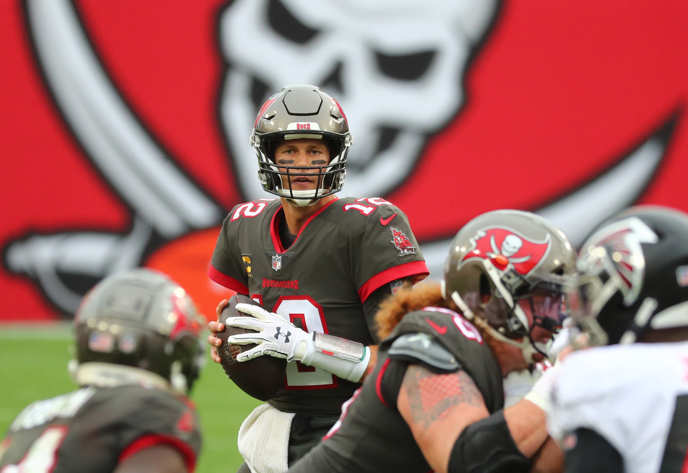 Bucs clinch fifth seed in NFC playoffs with win over Falcons | Reuters