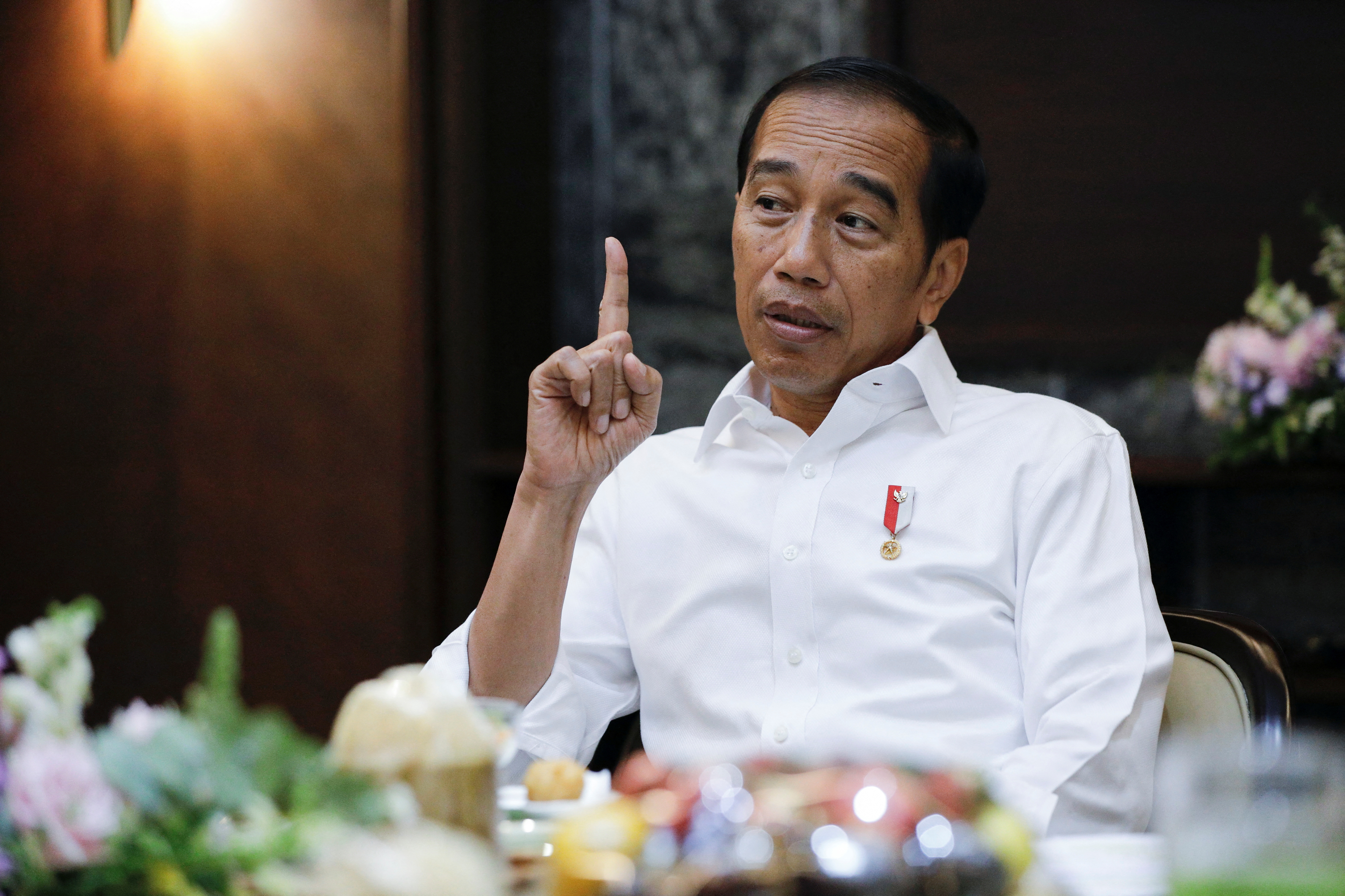 Indonesian President Joko Widodo attends an interview at the Presidential Palace in Jakarta