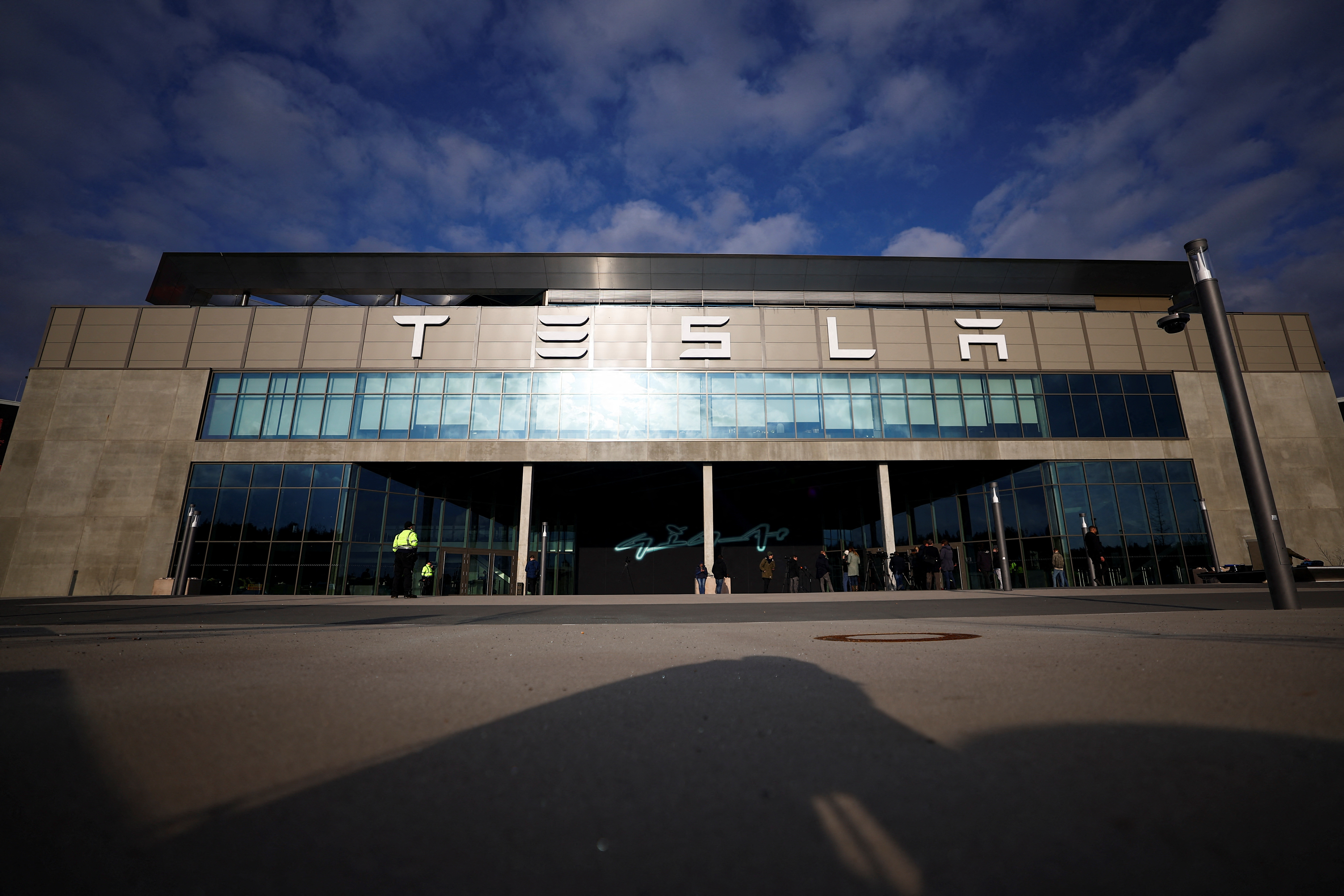Tesla's Gigafactory halts its production after a suspected arson attack, in Gruenheide
