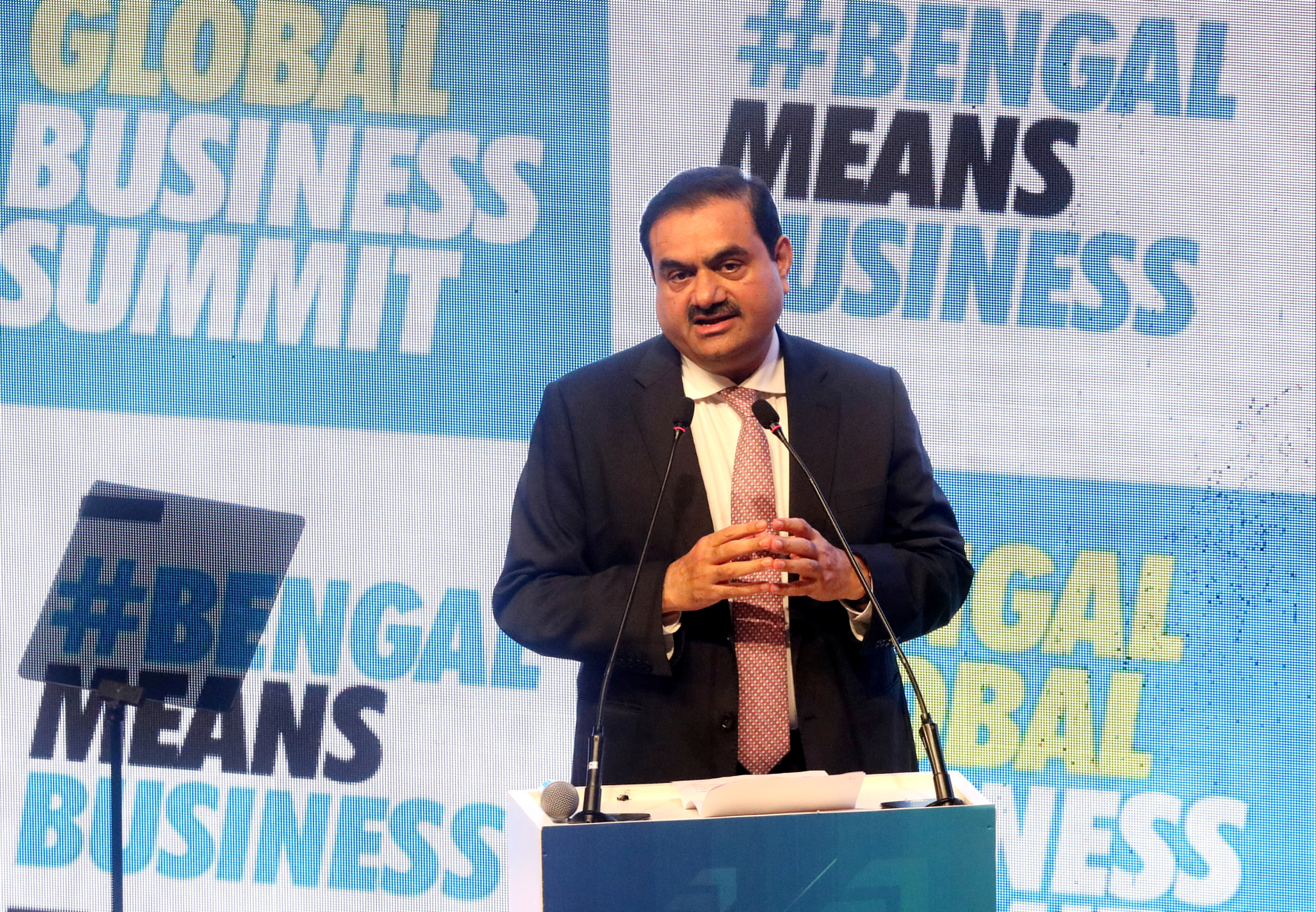 Indian billionaire Gautam Adani addresses delegates during the Bangladesh World Trade Summit in Kolkata