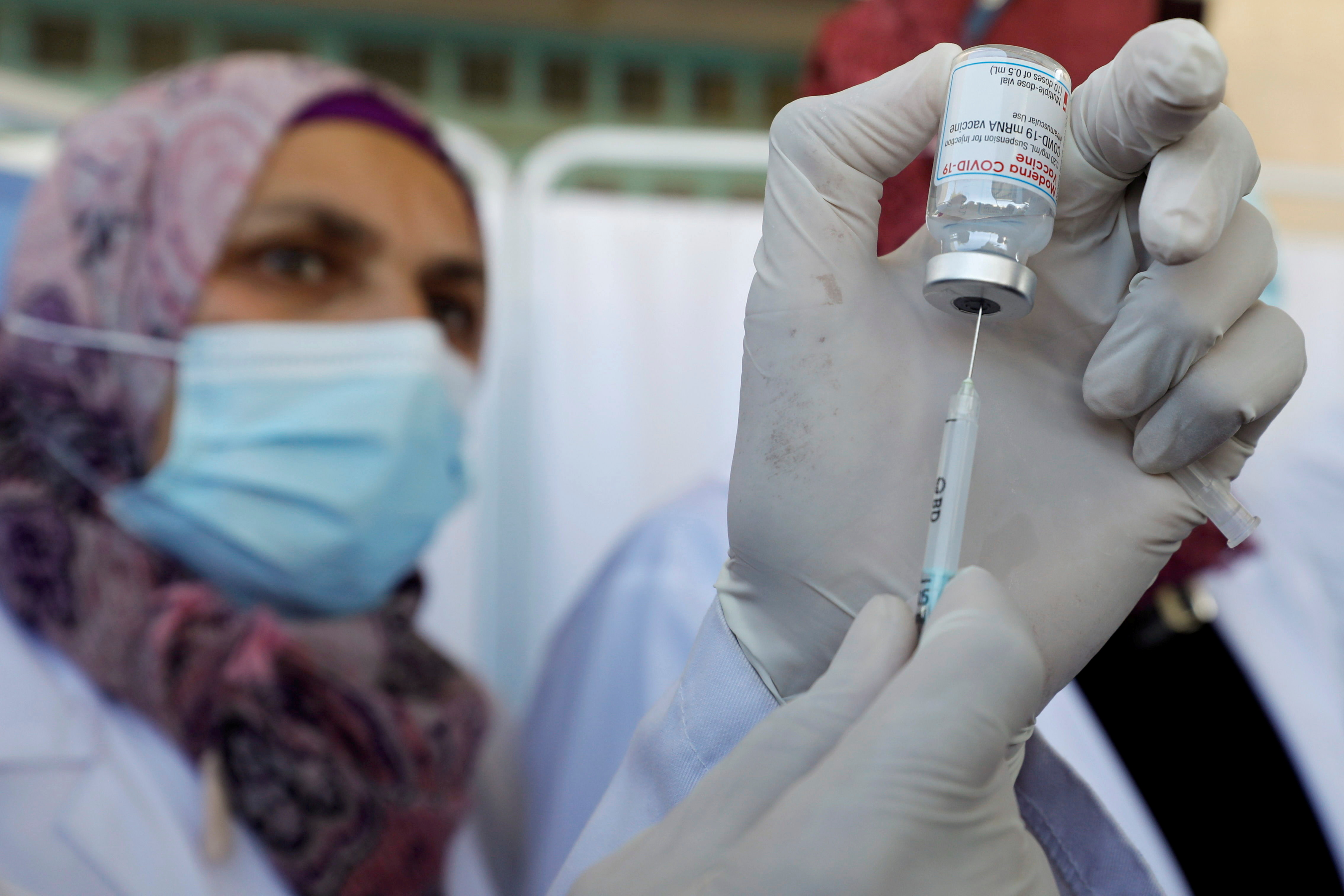 Palestinian health workers are vaccinated against COVID-19 in Bethlehem