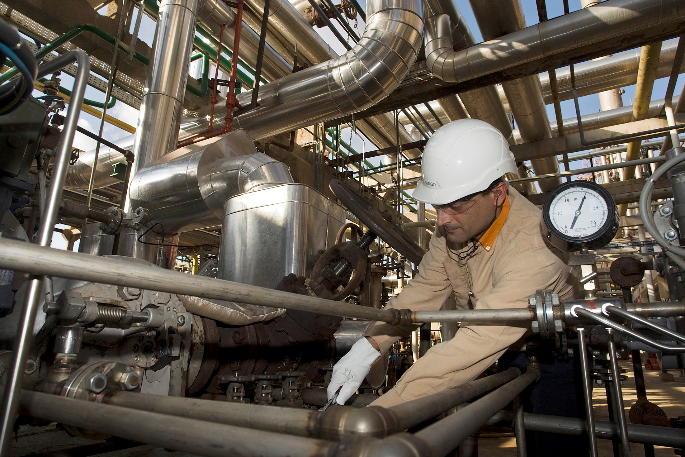 Employee works at Repsol YPF's refinery plant in Cartagena