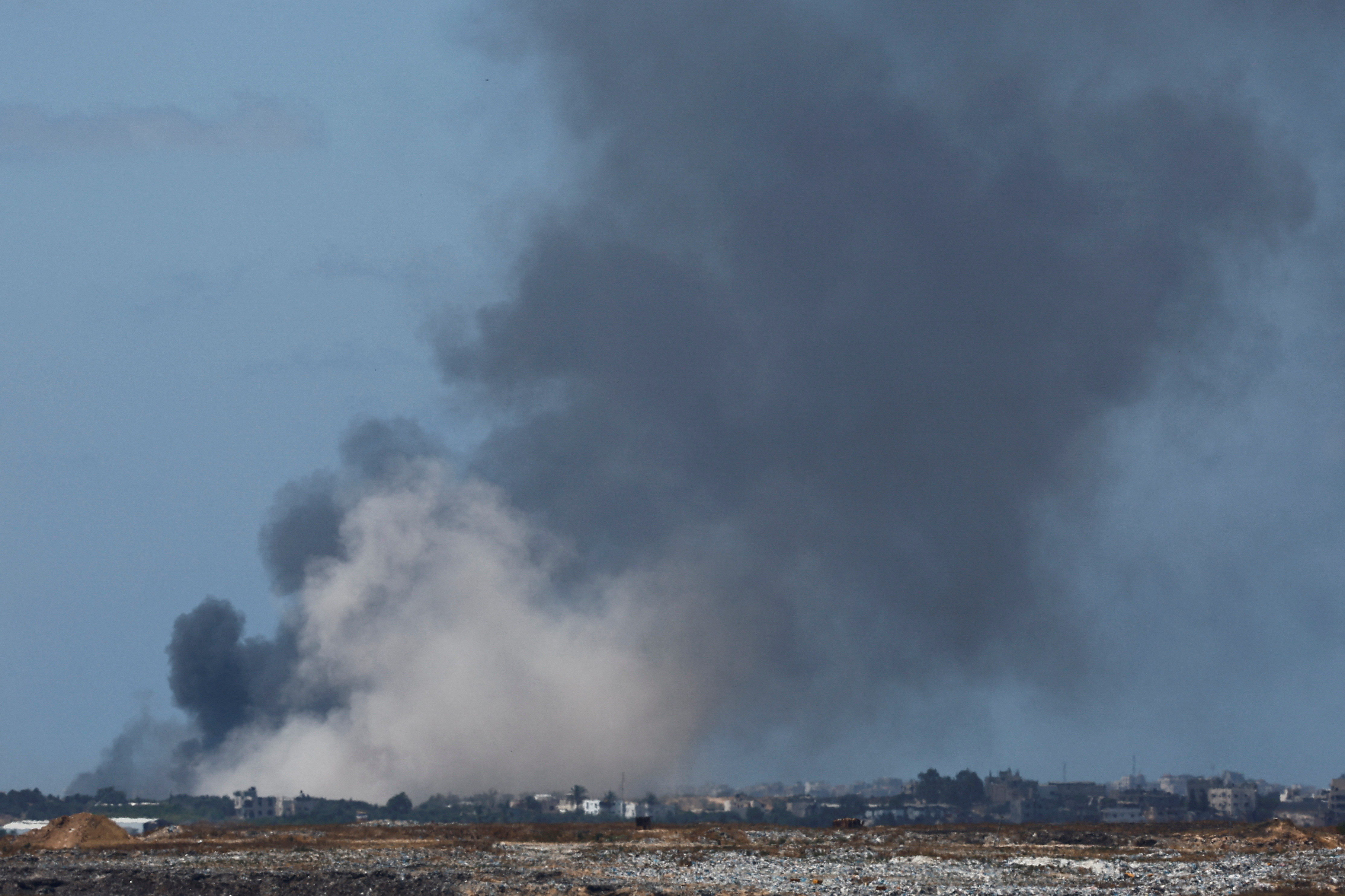 Smoke rises from an explosion in northern Gaza