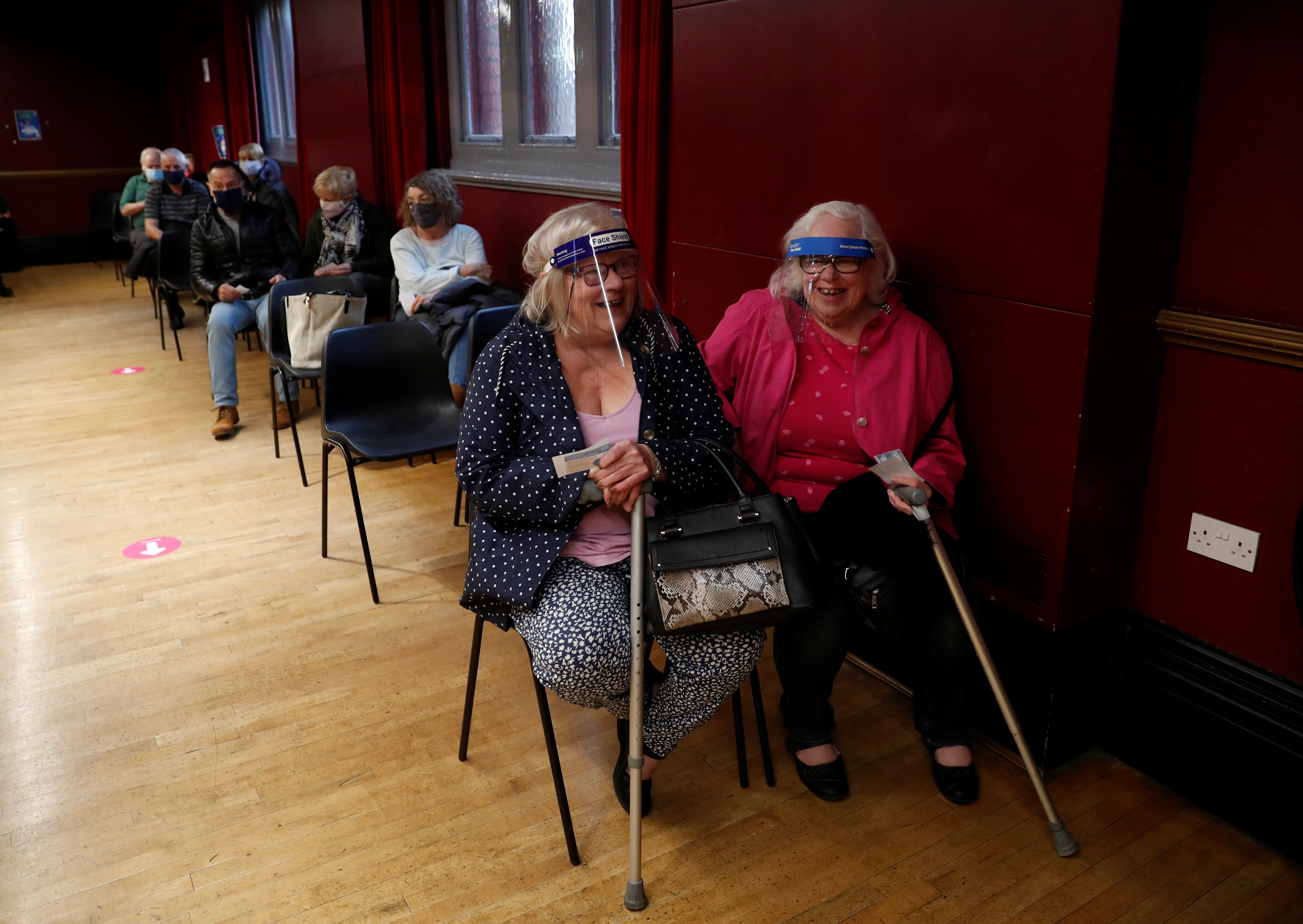 Patients wait for their vaccinations at the Hartlepool Town Hall Theatre vaccination centre, as the spread of the coronavirus disease (COVID-19) continues in Hartlepool
