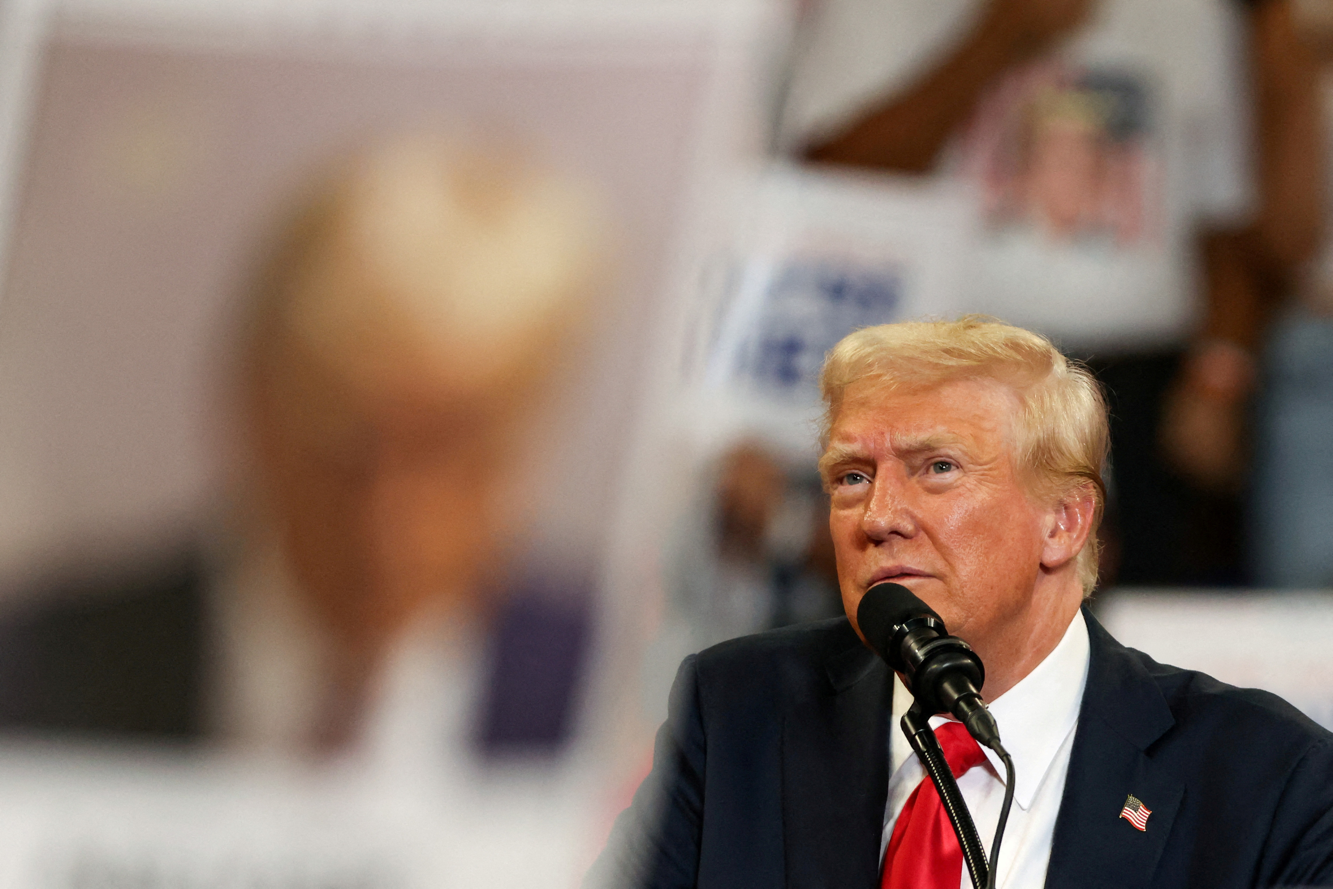 Republican presidential nominee and former U.S. President Donald Trump and his running mate JD Vance hold a campaign rally in Atlanta, Georgia