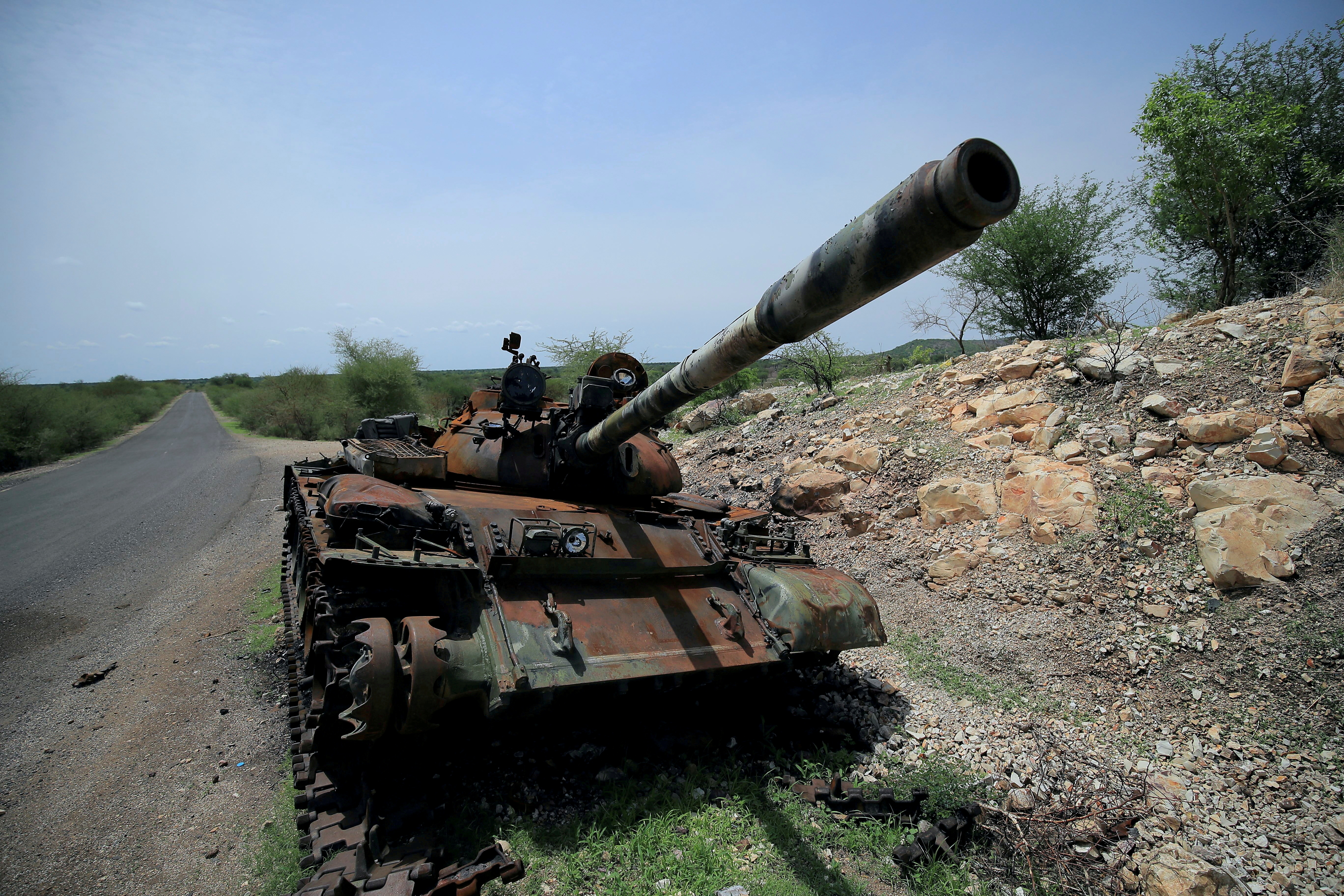 A tank damaged during the fighting between Ethiopia’s National Defense Force (ENDF) and Tigray Special Forces stands on the outskirts of Humera town