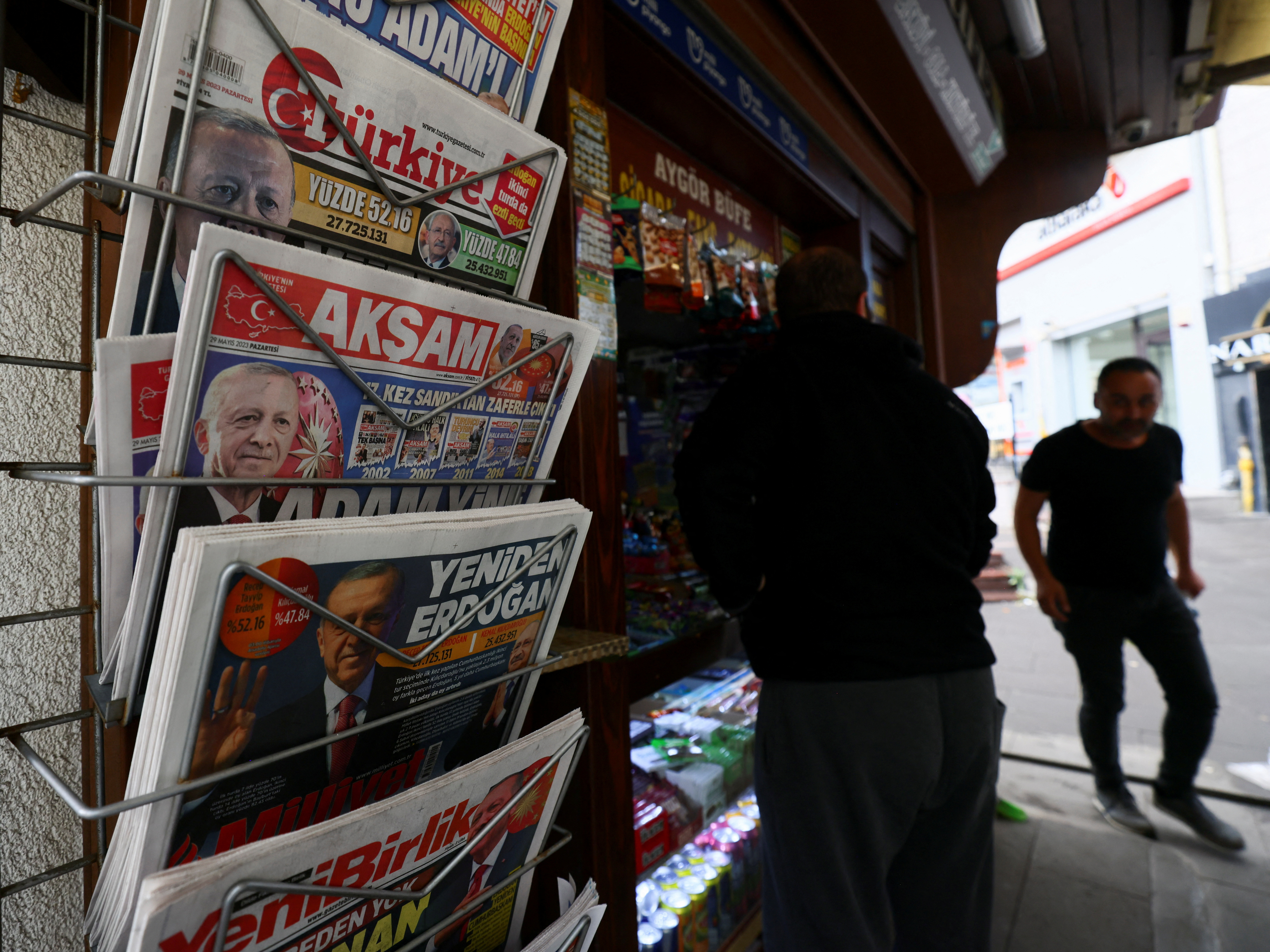 A view of newspapers on a stand at a shop, following the results of the second round of the presidential election, in Ankara