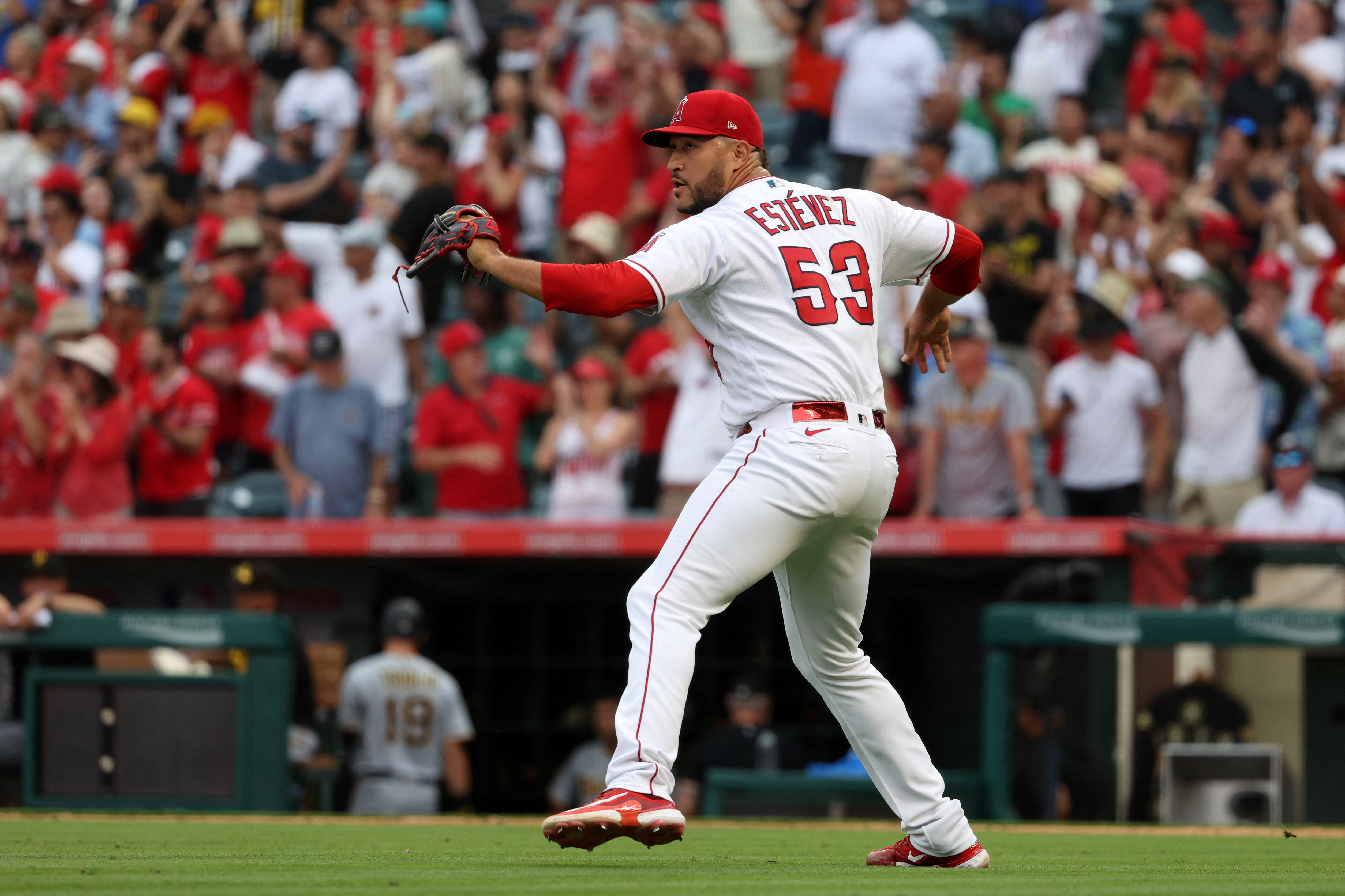 Angels hit four homers in win over Pirates