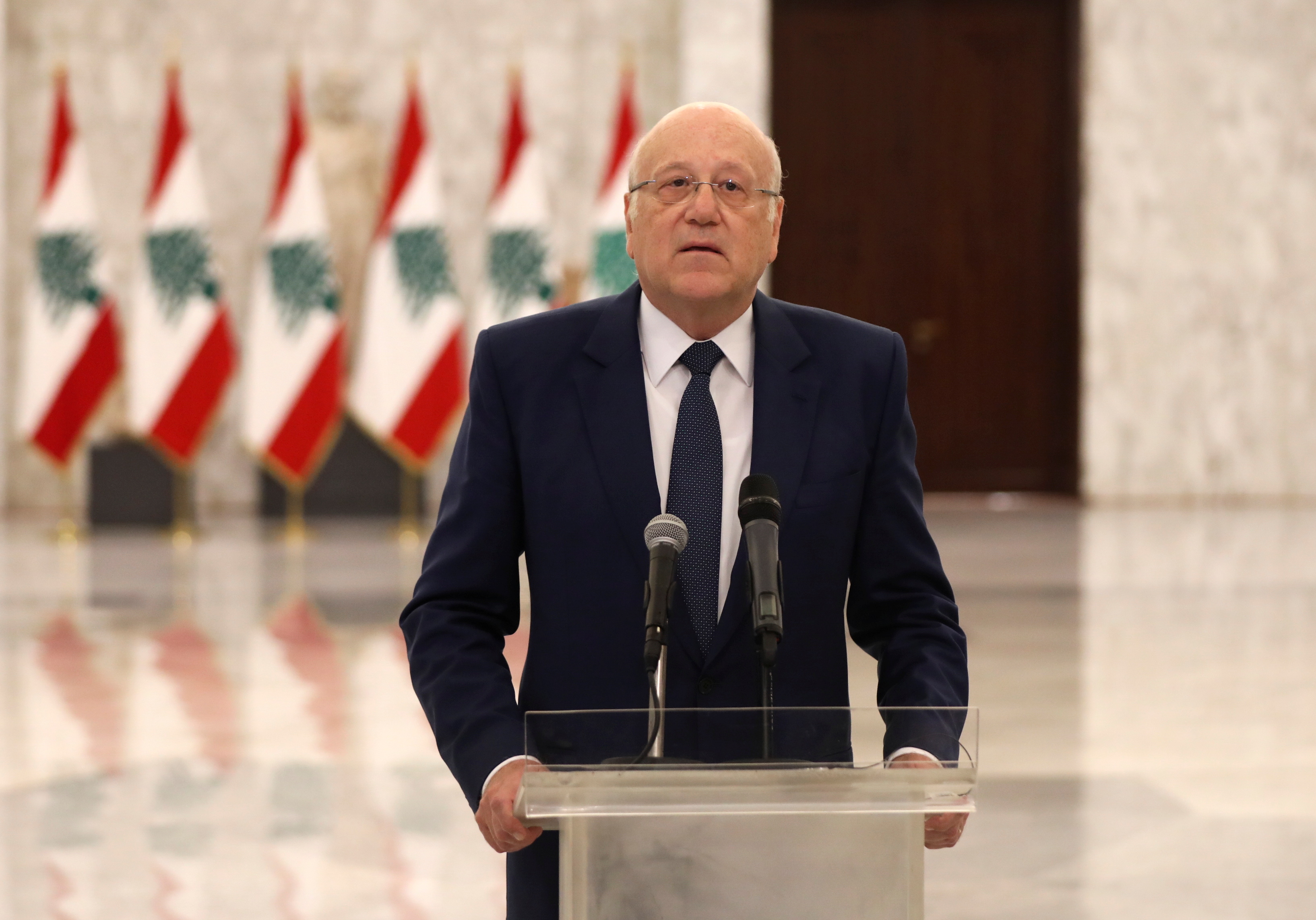 Lebanon's new Prime Minister-Designate Najib Mikati, talks at the presidential palace in Baabda