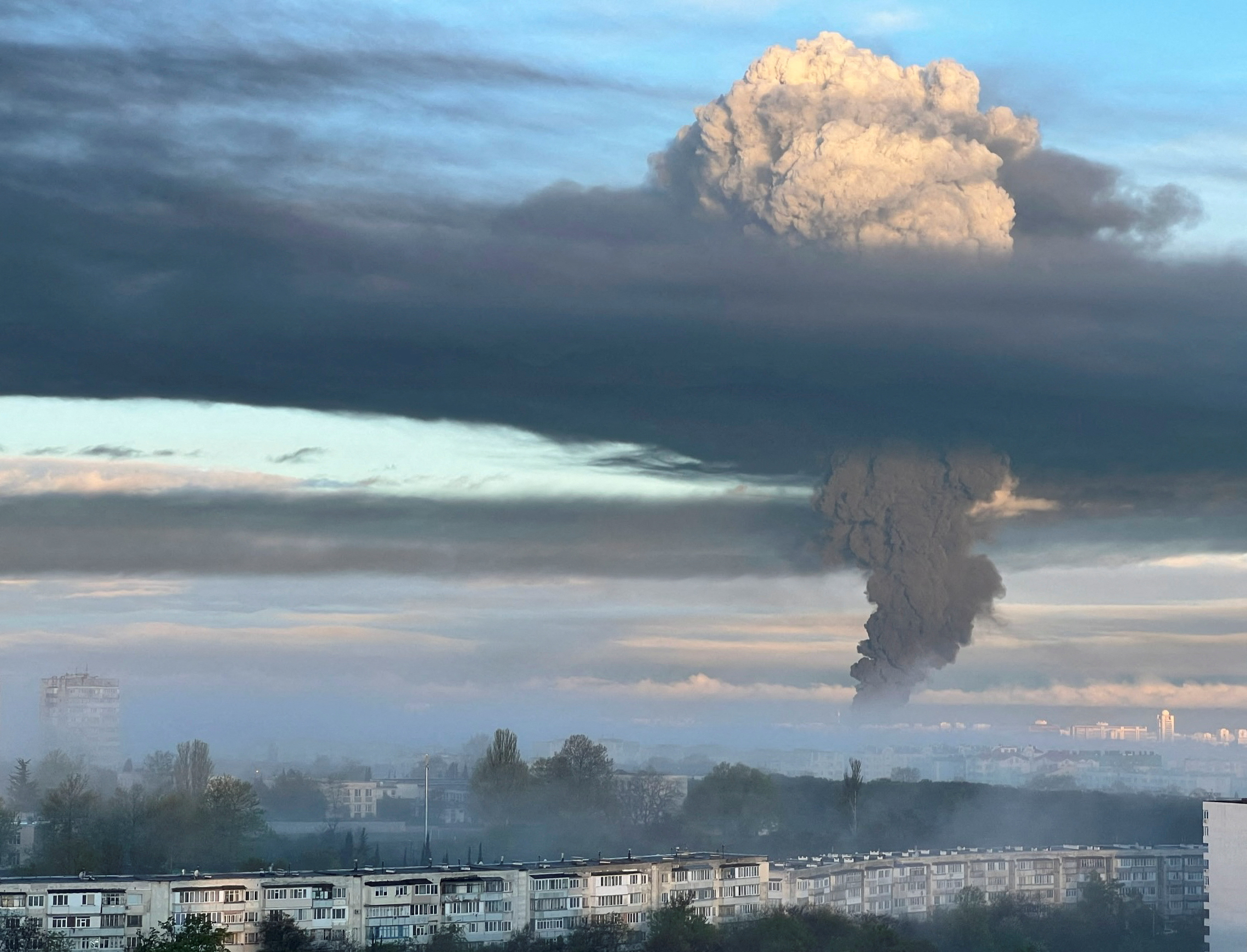 Smoke rises following an alleged drone attack in Sevastopol