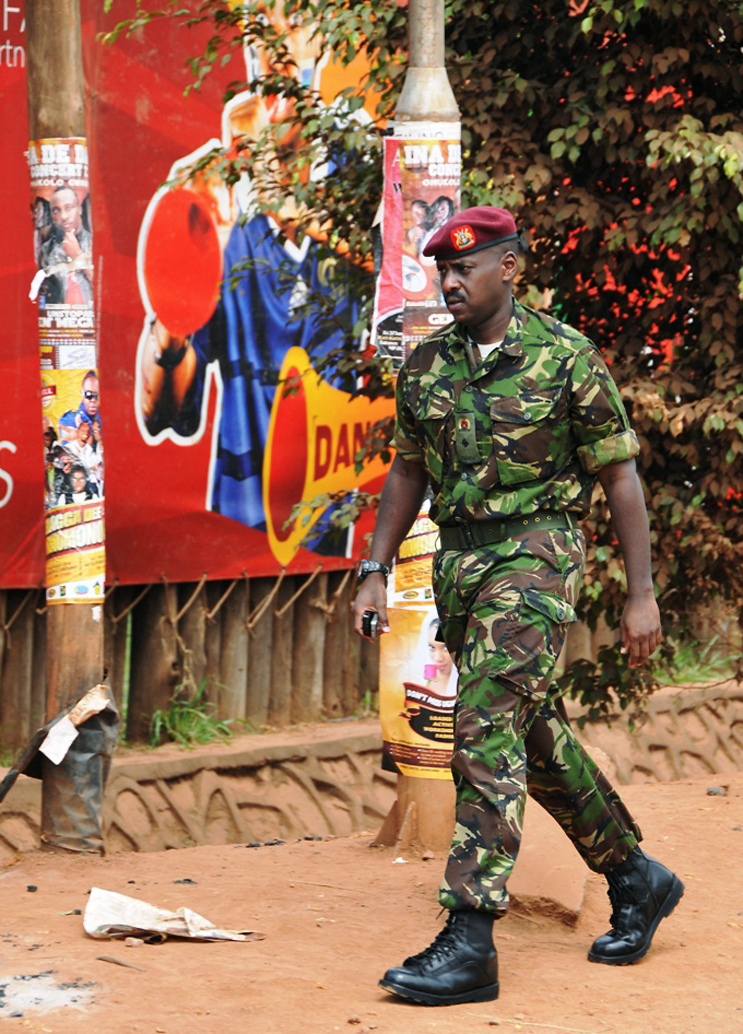 Muhoozi Kainerugaba, a son of Uganda's President Yoweri Museveni, arrives at the scene of a blast in Kampala