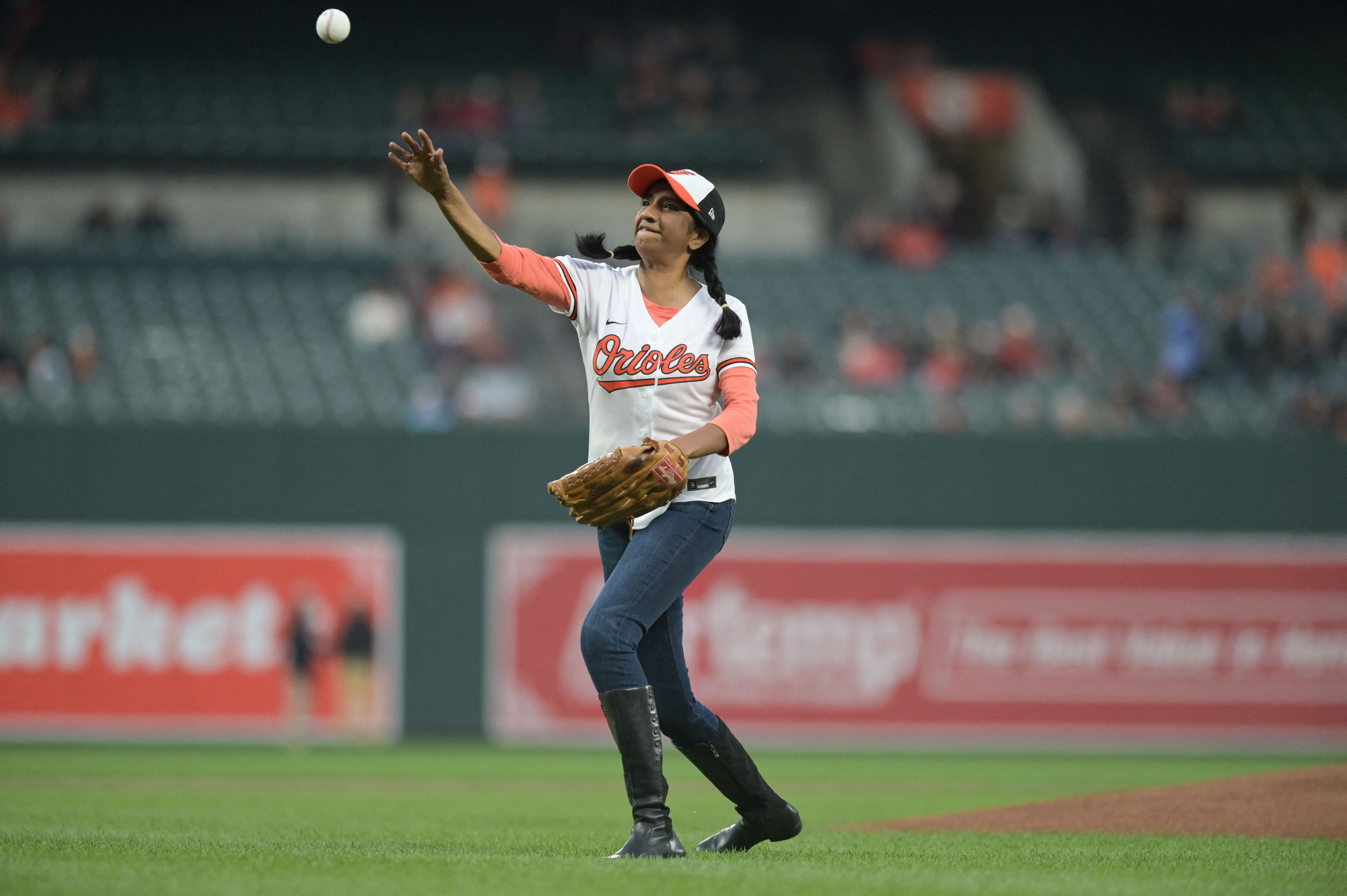 Download Adley Rutschman In Action On The Baseball Field Wallpaper