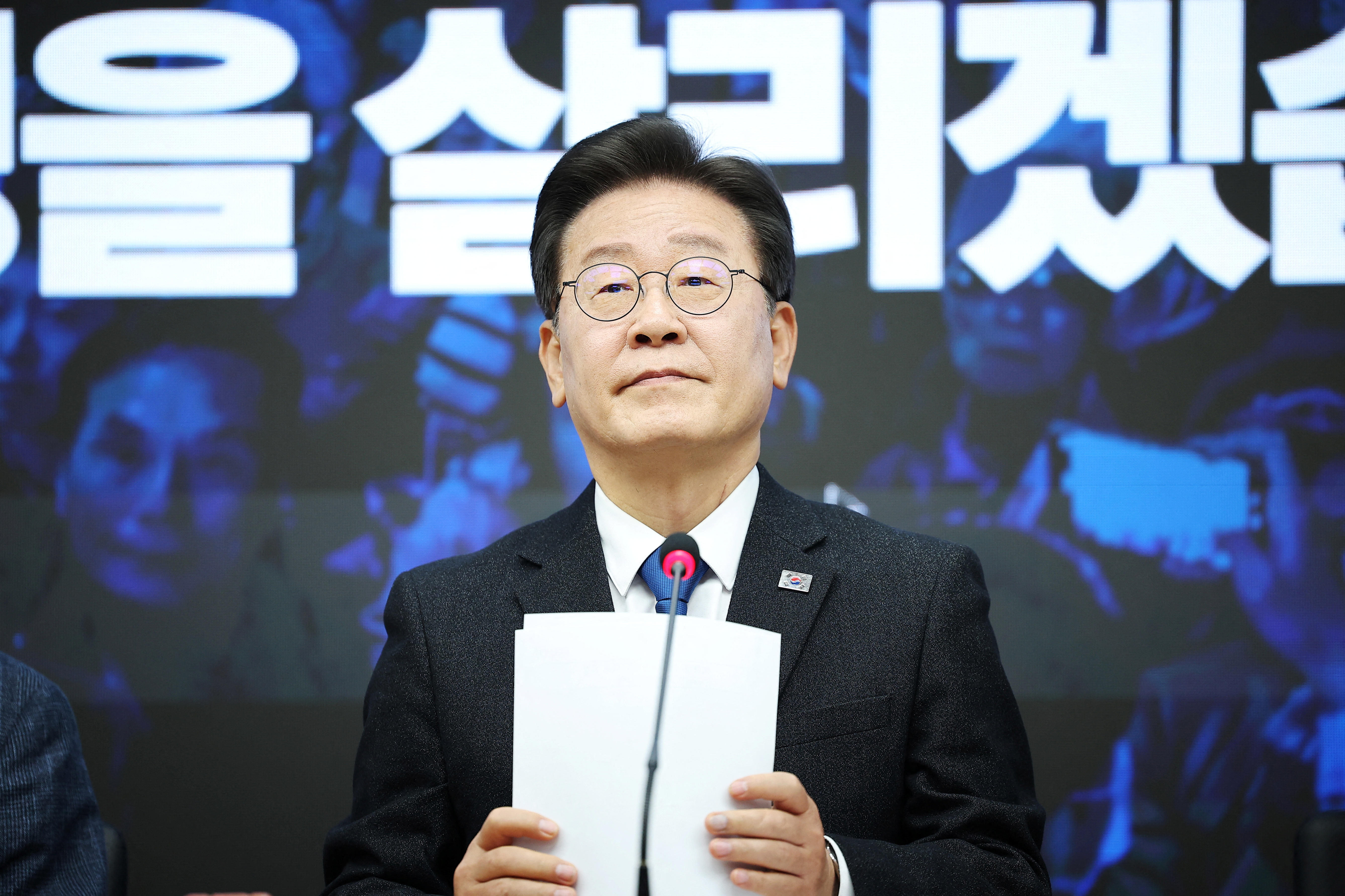 Lee Jae-myung, leader of the main opposition Democratic Party, attends an event to disband the election camp for the 22nd parliamentary election in Seoul