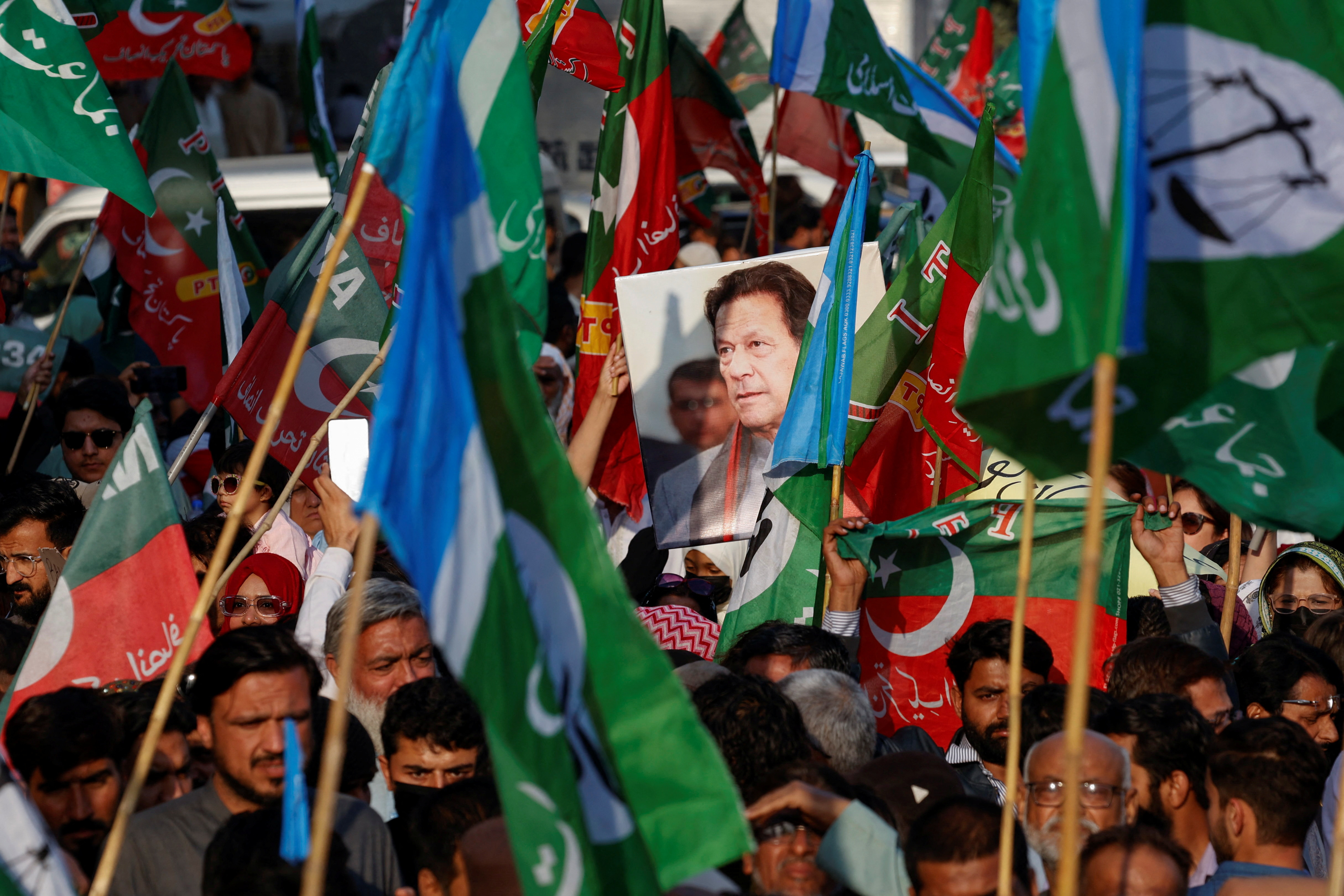 Pakistan election: Imran Khan's party wants to form government, threatens  protests | Reuters