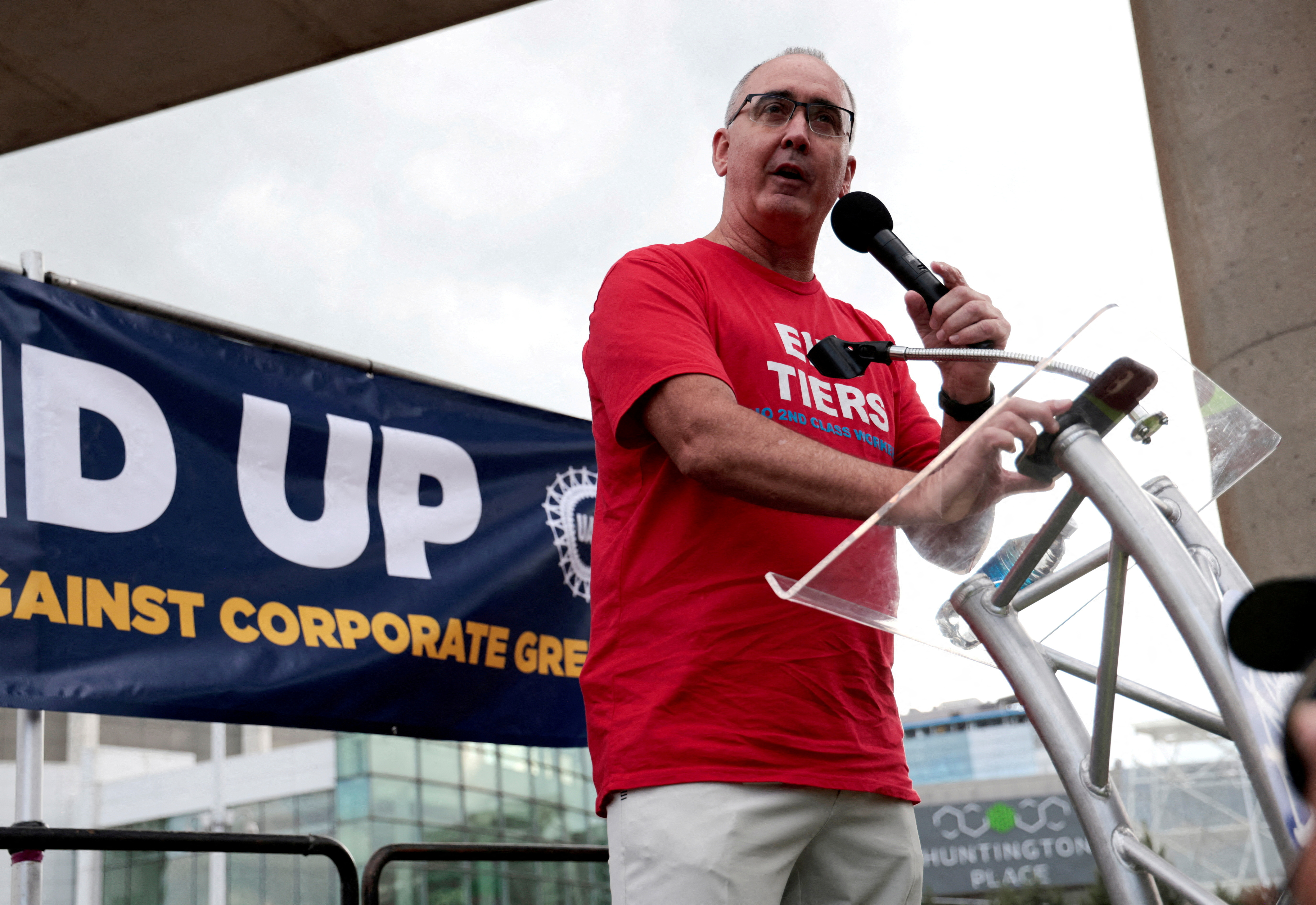 United Auto Workers President Shawn Fain addresses the audience during a rally in support of striking UAW