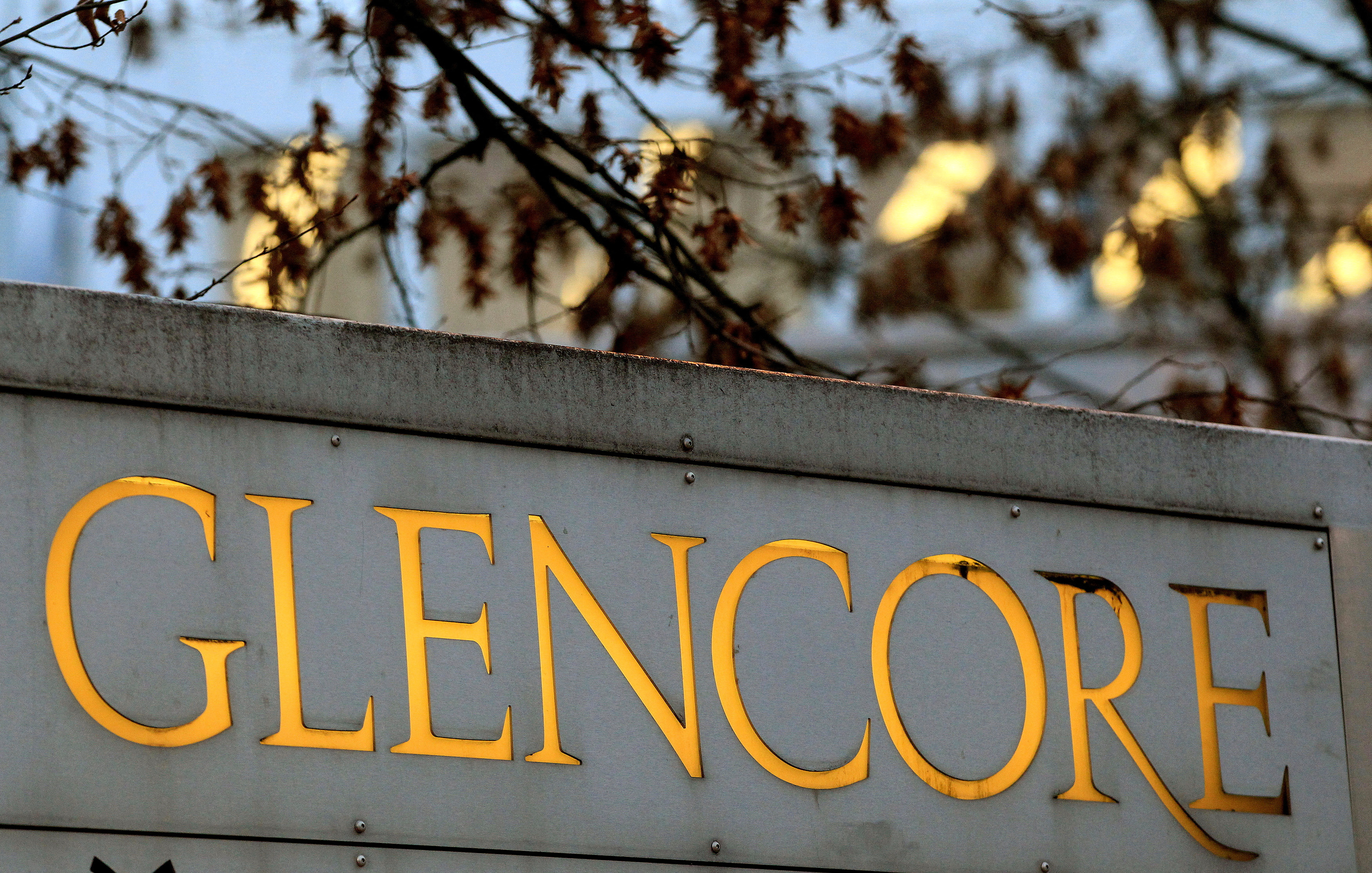 The logo of commodities trader Glencore is pictured in front of the company's headquarters in Baar