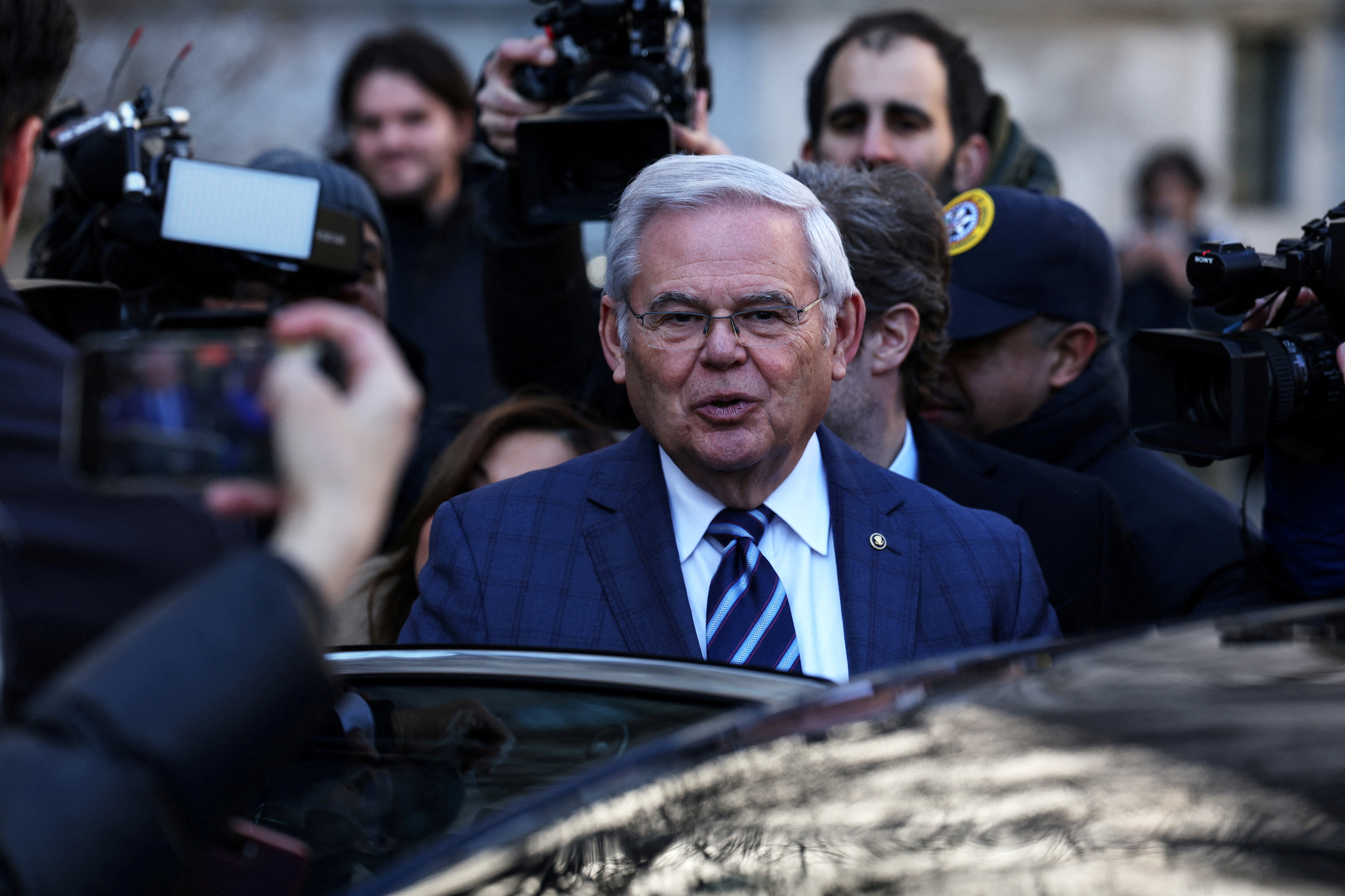 U.S. Senator Bob Menendez leaves his arraignment on a new 18-count indictment, at Manhattan federal court in New York City