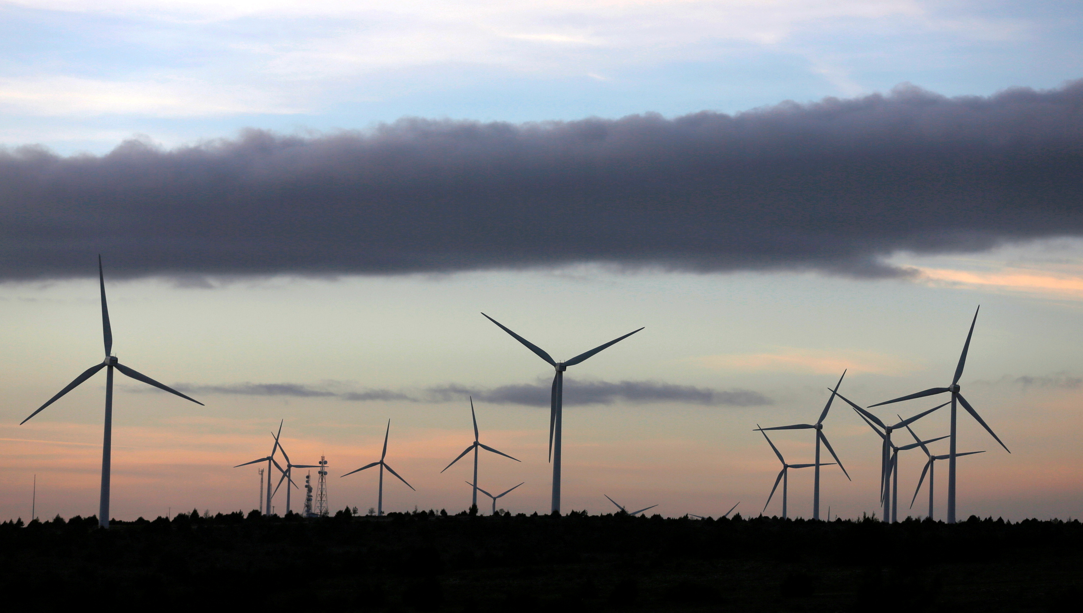 Iberdrola's wind turbines at dusk in Moranchon, Spain