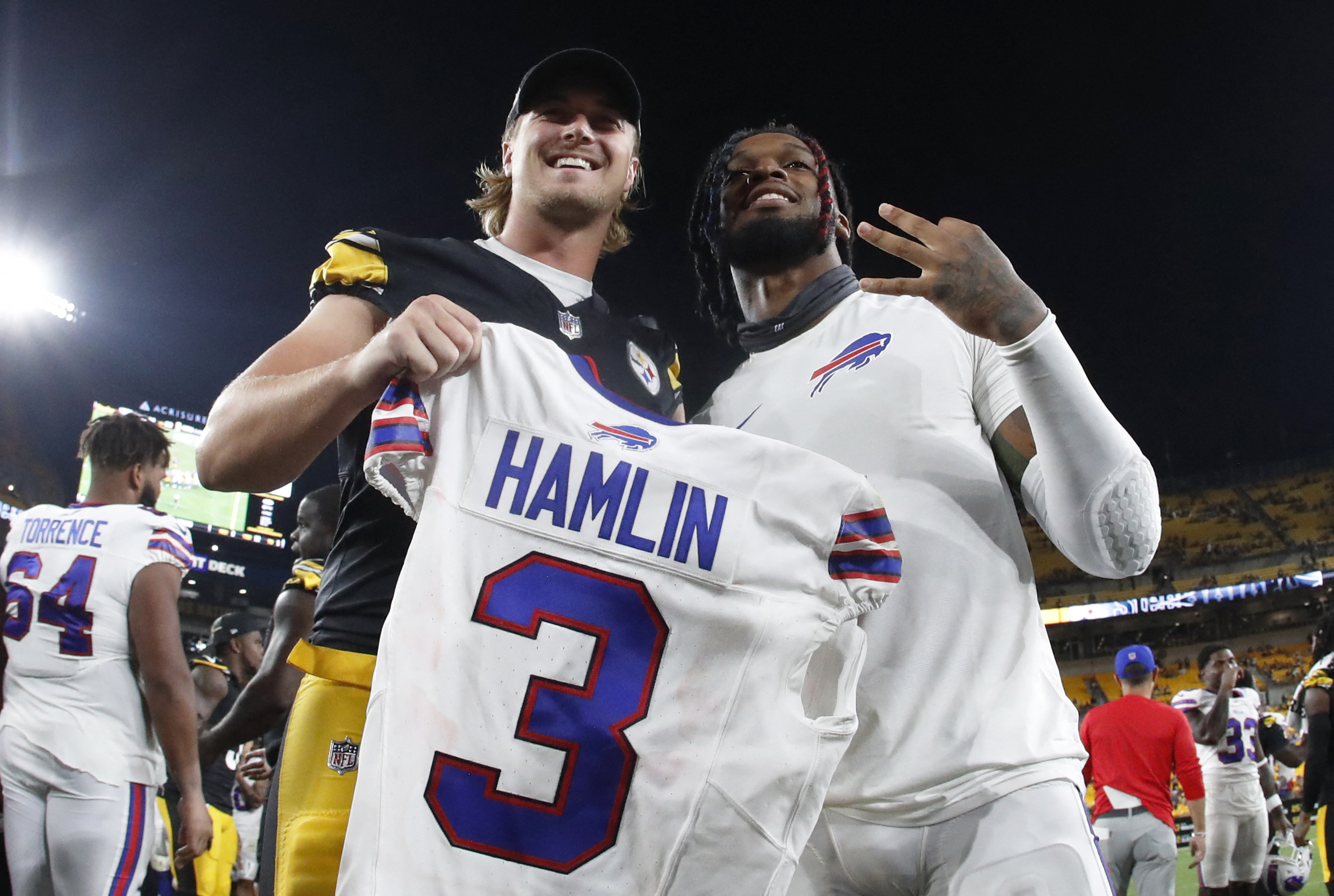 Pittsburgh Steelers quarterback Kenny Pickett, center, sits on the bench  during an NFL preseason football game against the Buffalo Bills in  Pittsburgh, Sunday, Aug. 20, 2023. (AP Photo/Gene J. Puskar Stock Photo 