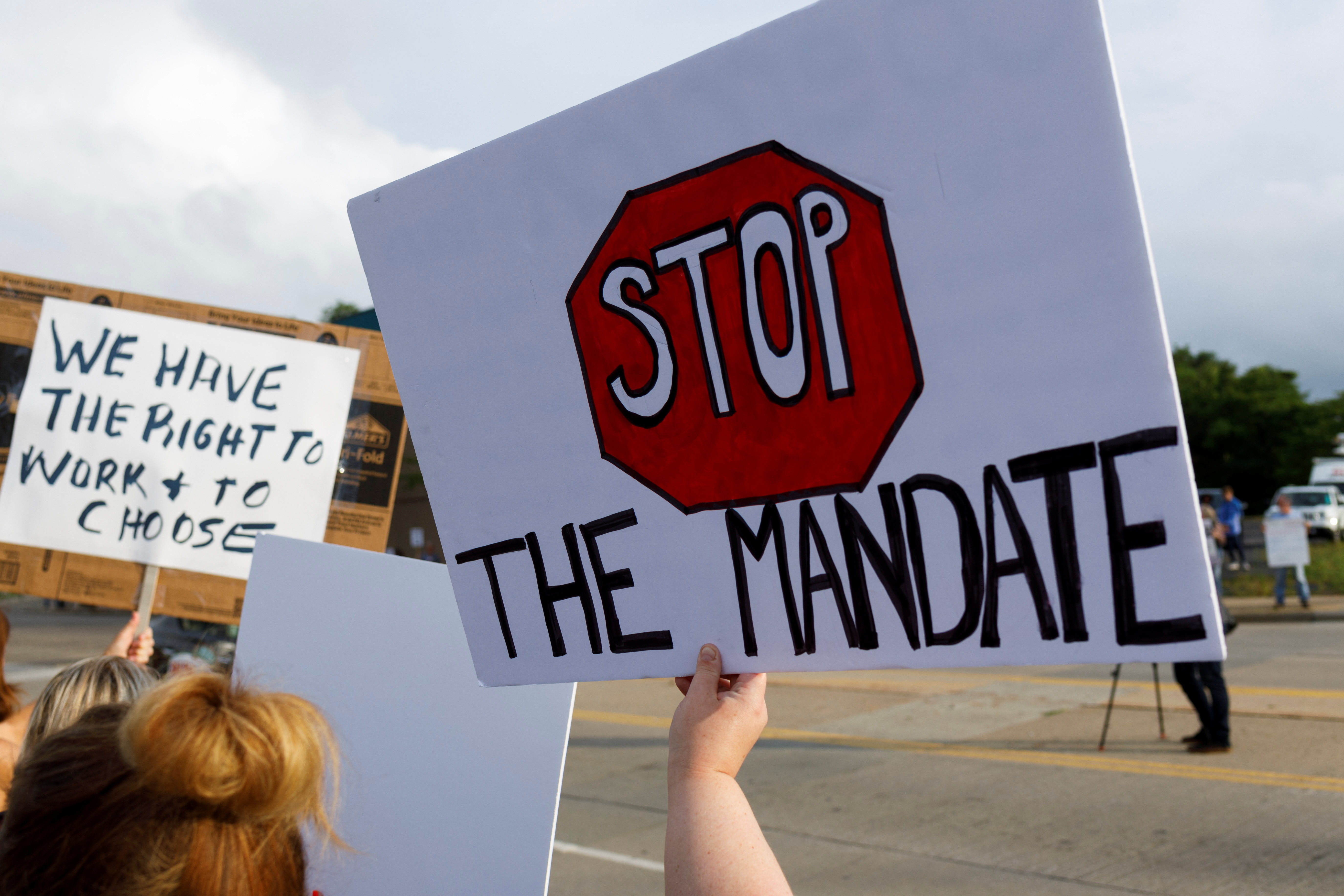 People protest vaccine mandates at Summa Health Hospital in Ohio