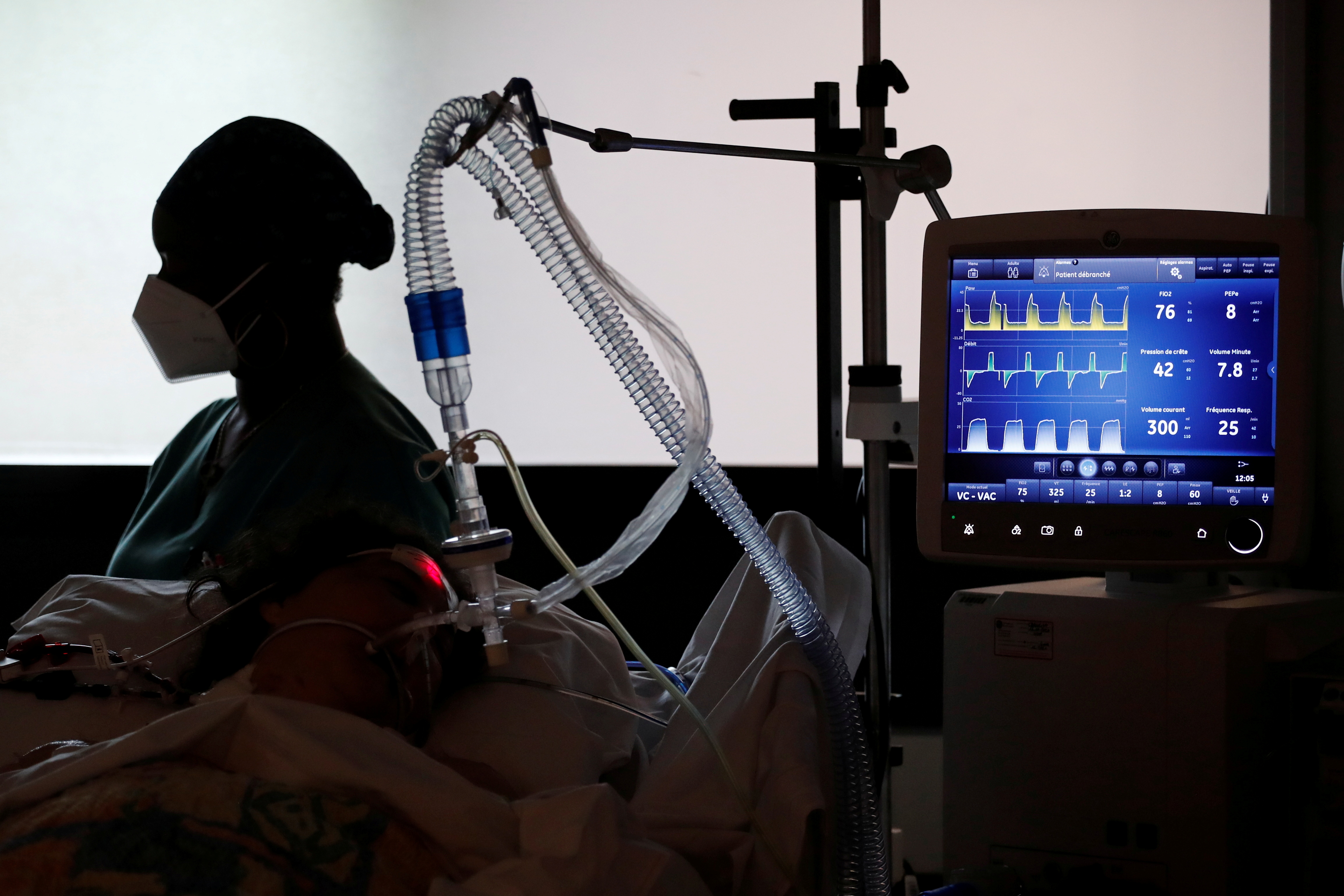 A COVID-19 patient connected to a ventilator tube in the Intensive Care Unit (ICU) at the Centre Cardiologique du Nord private hospital in Saint-Denis, near Paris, amid the coronavirus disease pandemic in France, May 4