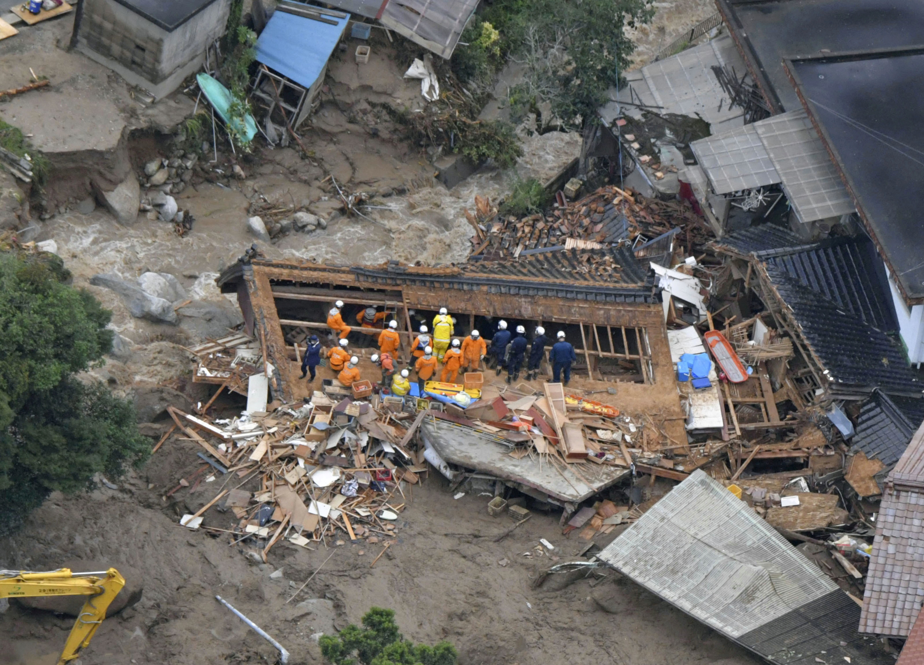 Photo taken from a helicopter shows the site of a mudslide following heavy rain in Karatsu