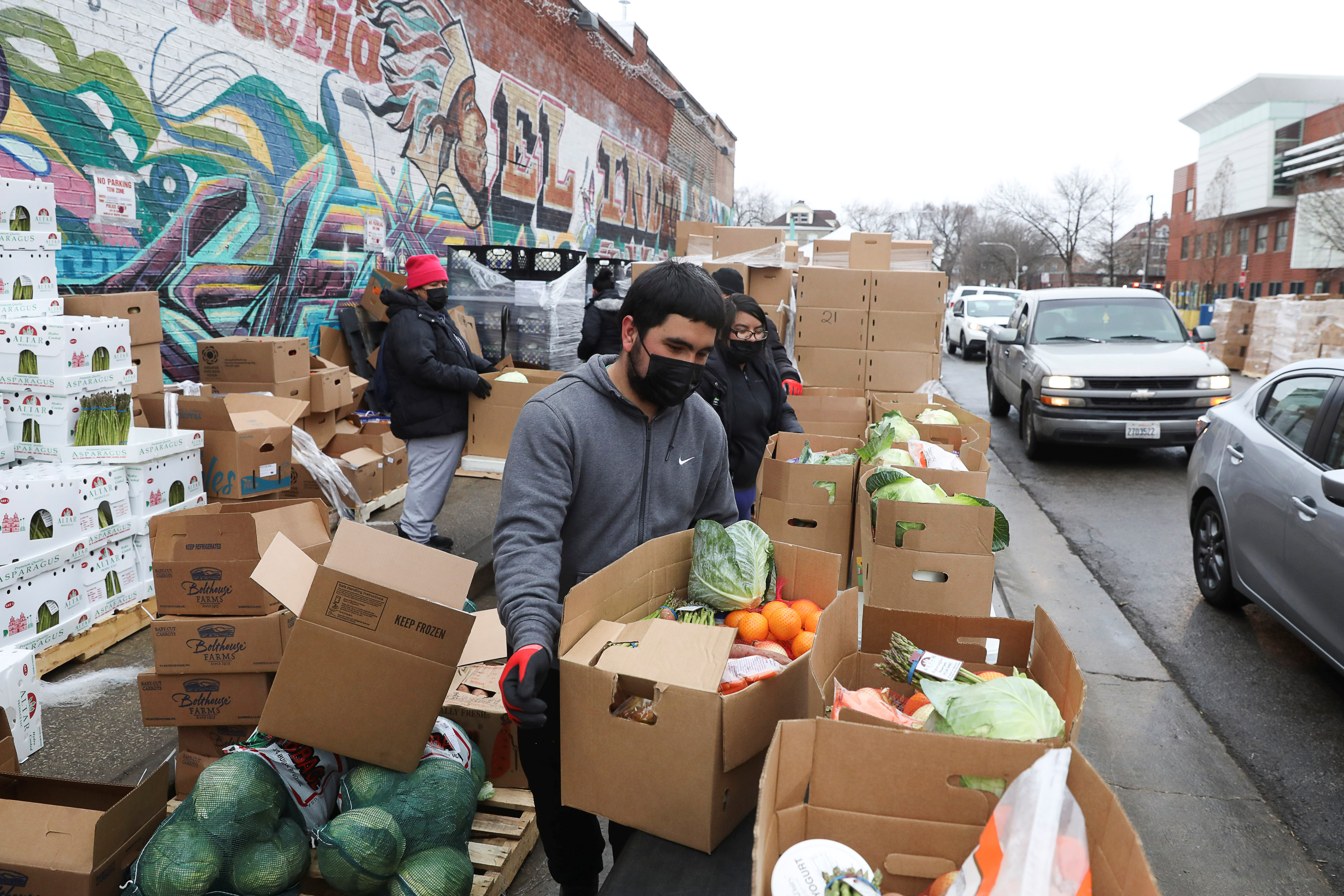 Food is distributed at the nonprofit New Life Centers' food pantry in Chicago