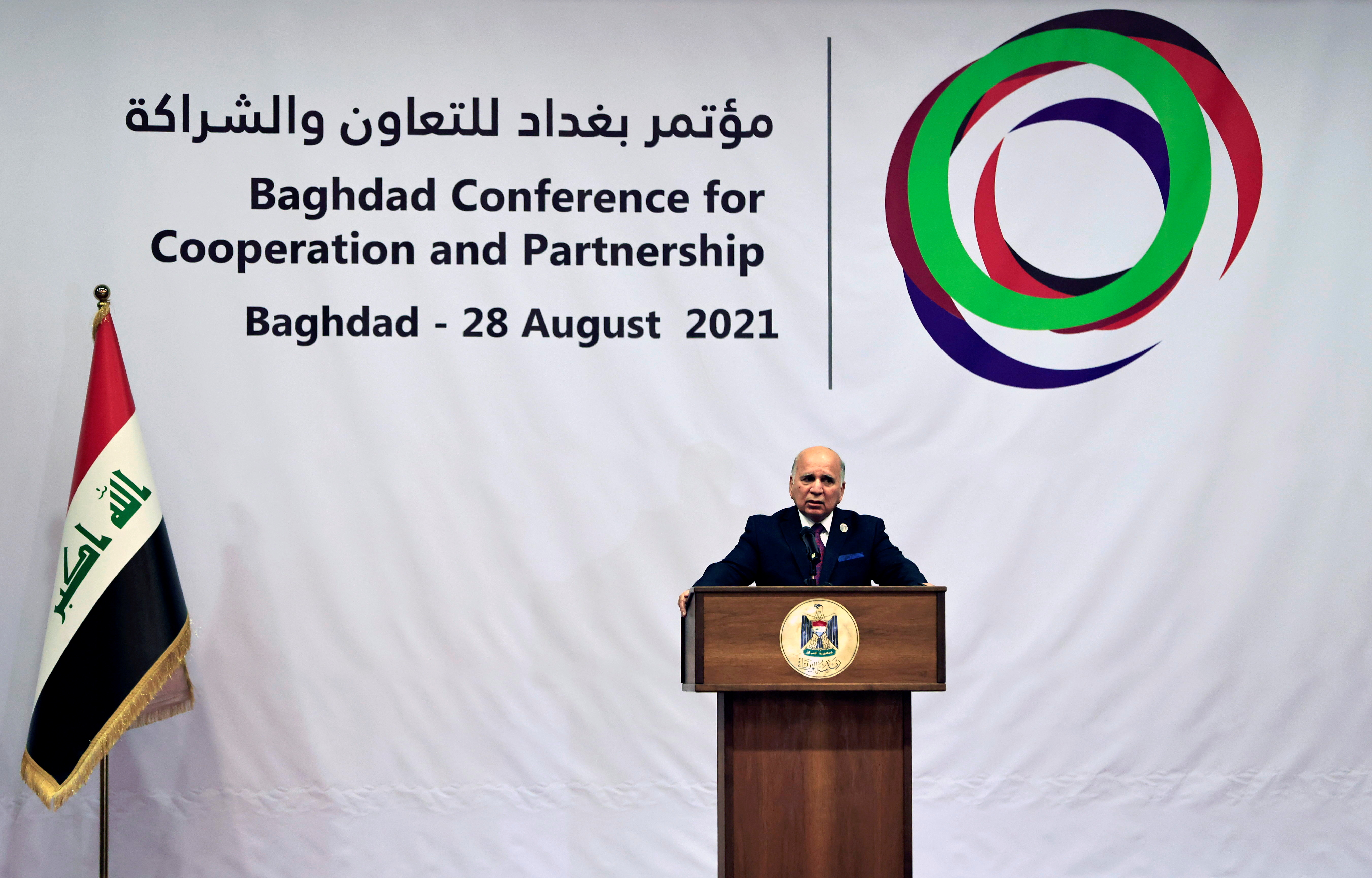 Iraqi Foreign Minister Hussein speaks to the media after the end of the summit in Baghdad