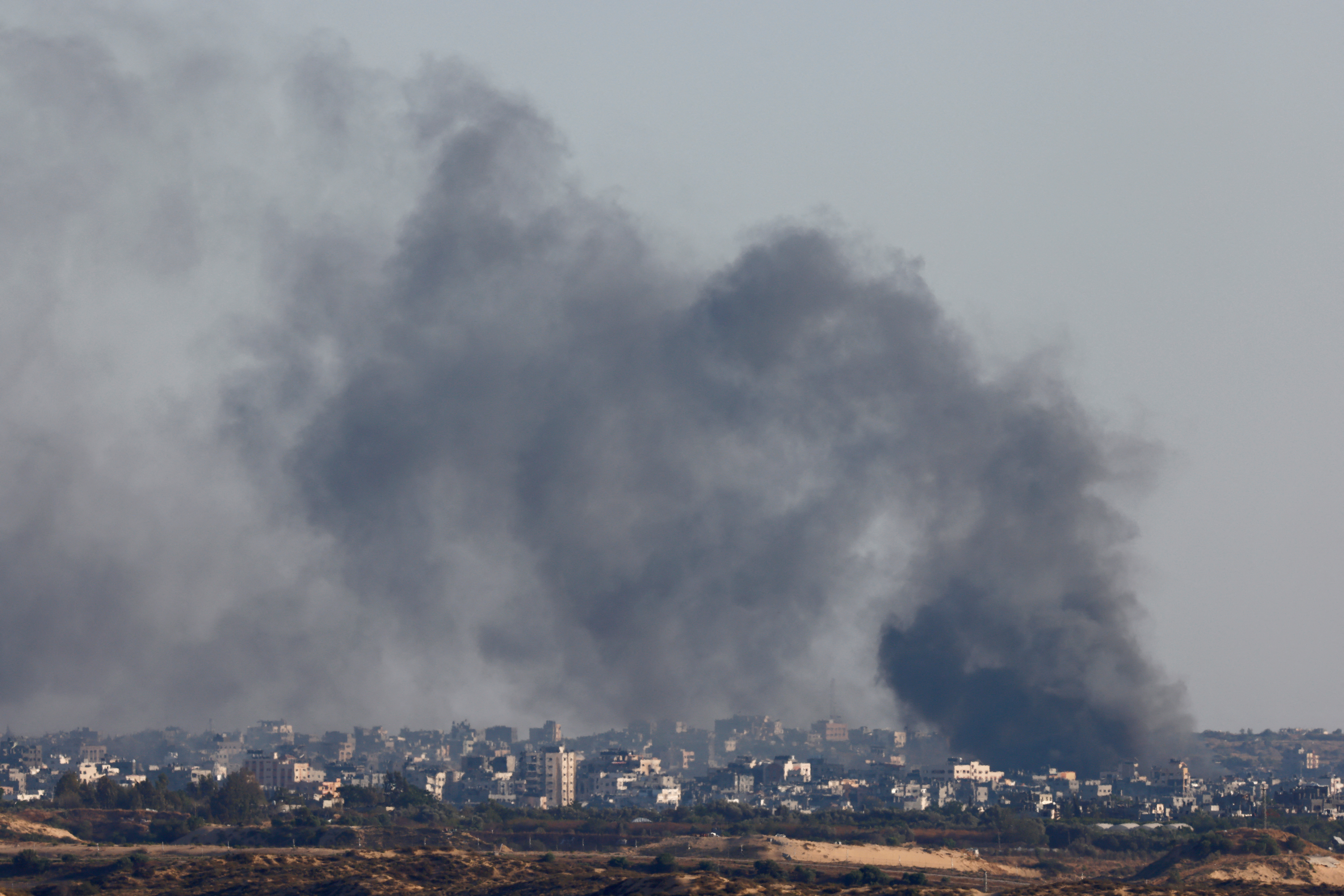Smoke rises following an explosion in Gaza, amid the ongoing conflict between Israel and the Palestinian Islamist group Hamas, near the Israel-Gaza border, as seen from Israel