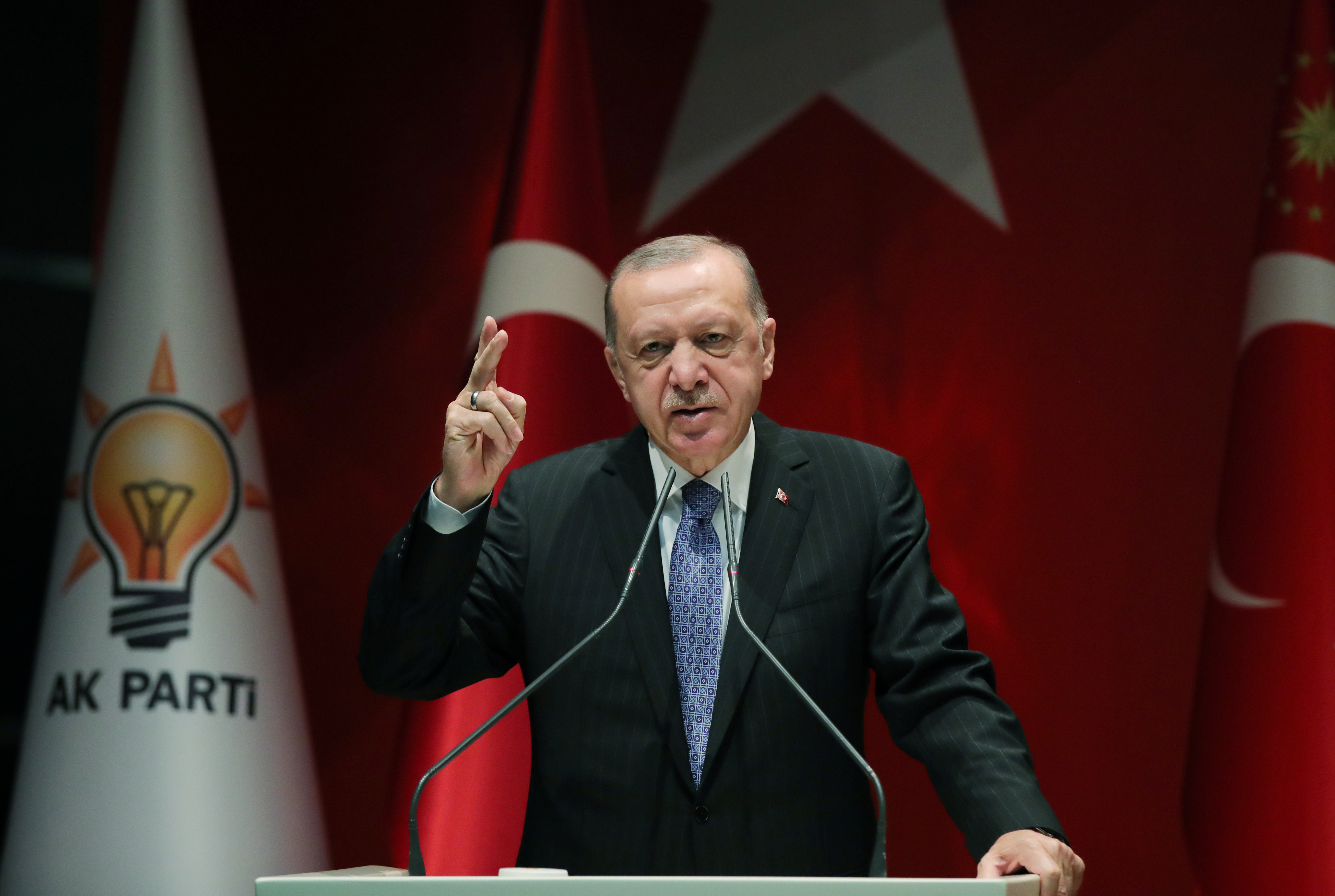 Turkish President Tayyip Erdogan addresses members of his ruling AK Party (AKP) during a meeting at the party headquarters in Ankara, Turkey, November 23, 2021. Murat Cetinmuhurdar/PPO/Handout via REUTERS 