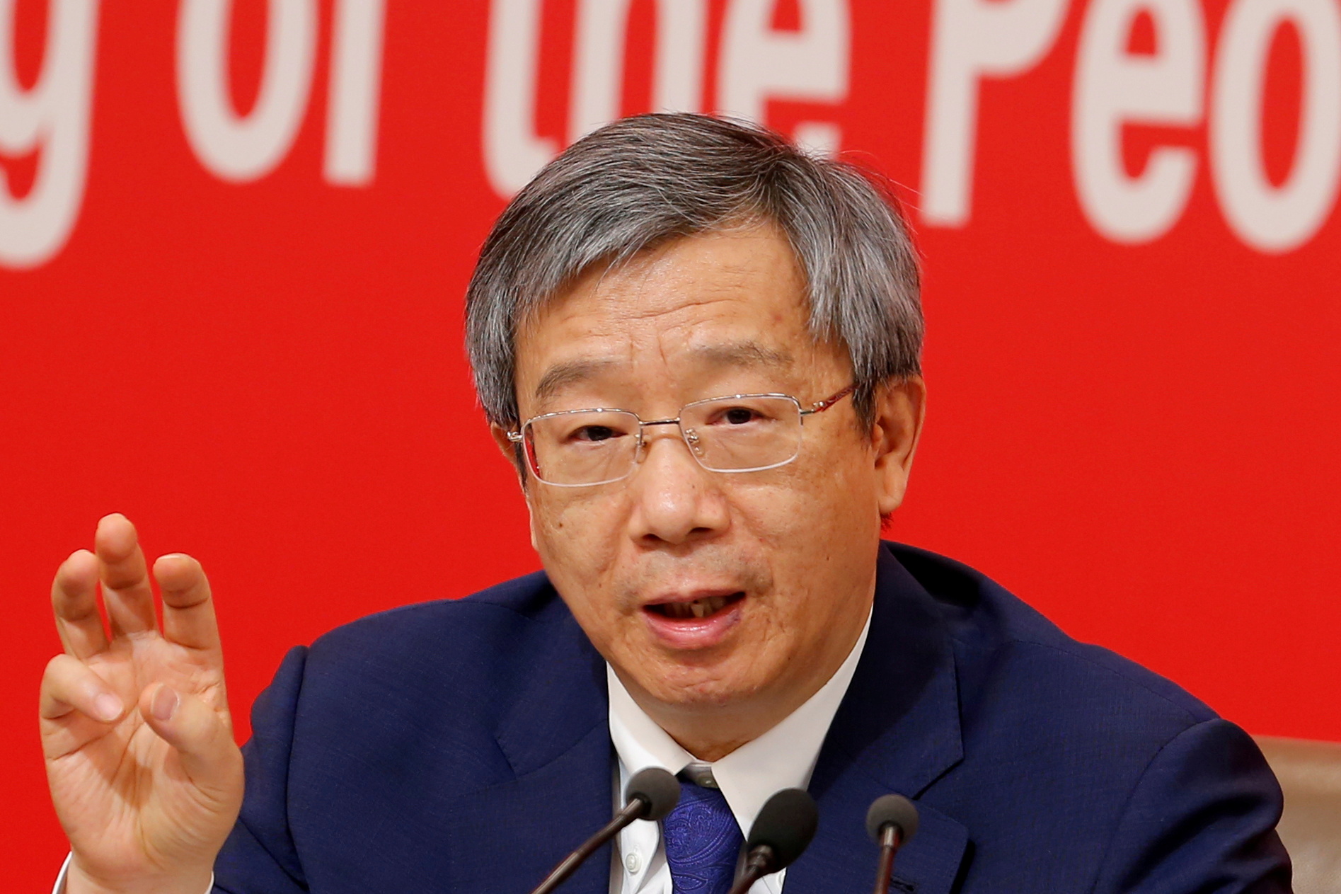 Governor of People's Bank of China (PBOC) Yi Gang attends a news conference on China's economic development ahead of the 70th anniversary of its founding, in Beijing, China September 24, 2019. REUTERS/Florence Lo