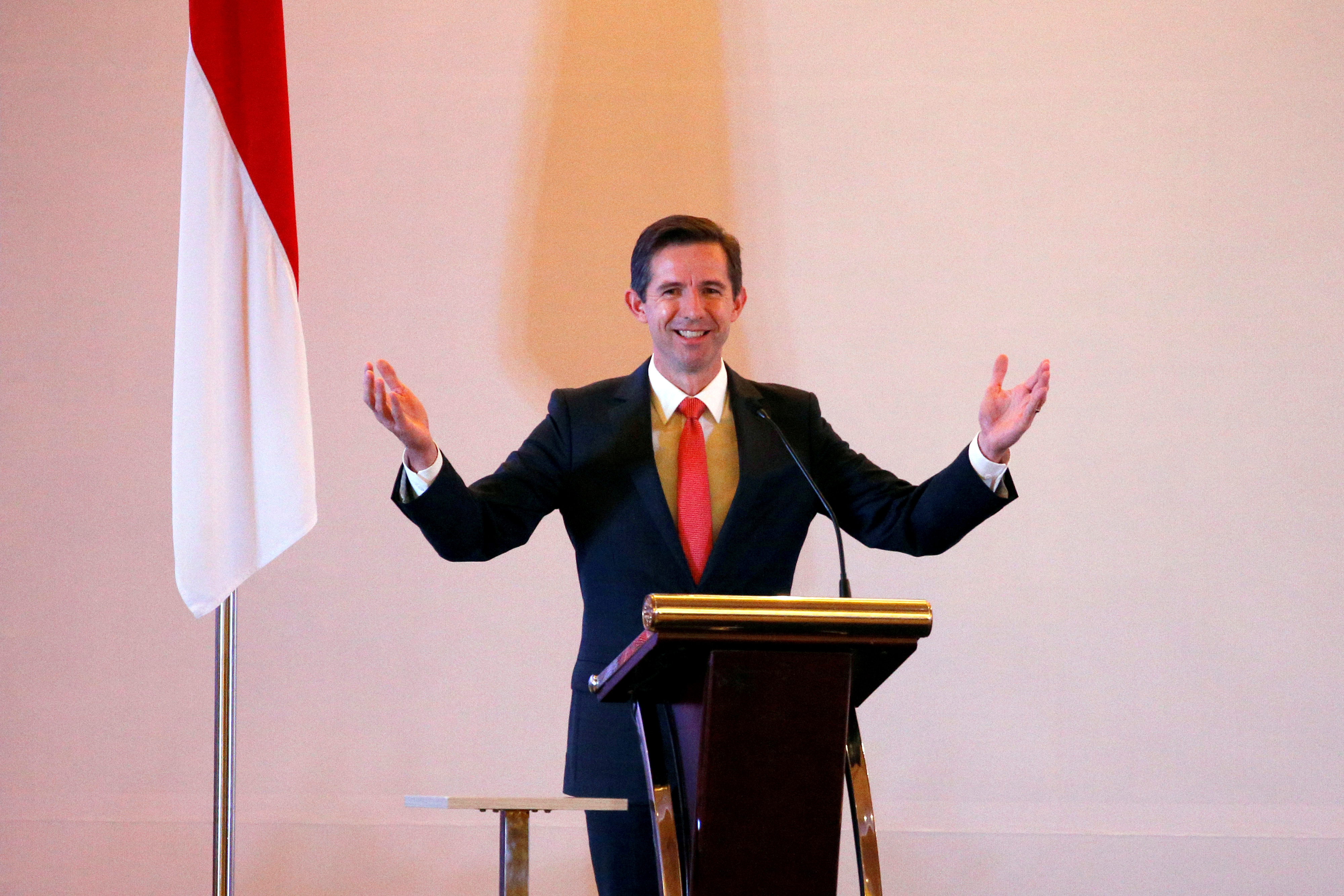 Australia's Minister of Trade, Tourism and Investment Simon Birmingham gestures as he speaks during a signing ceremony with Indonesia's Trade Minister in Jakarta