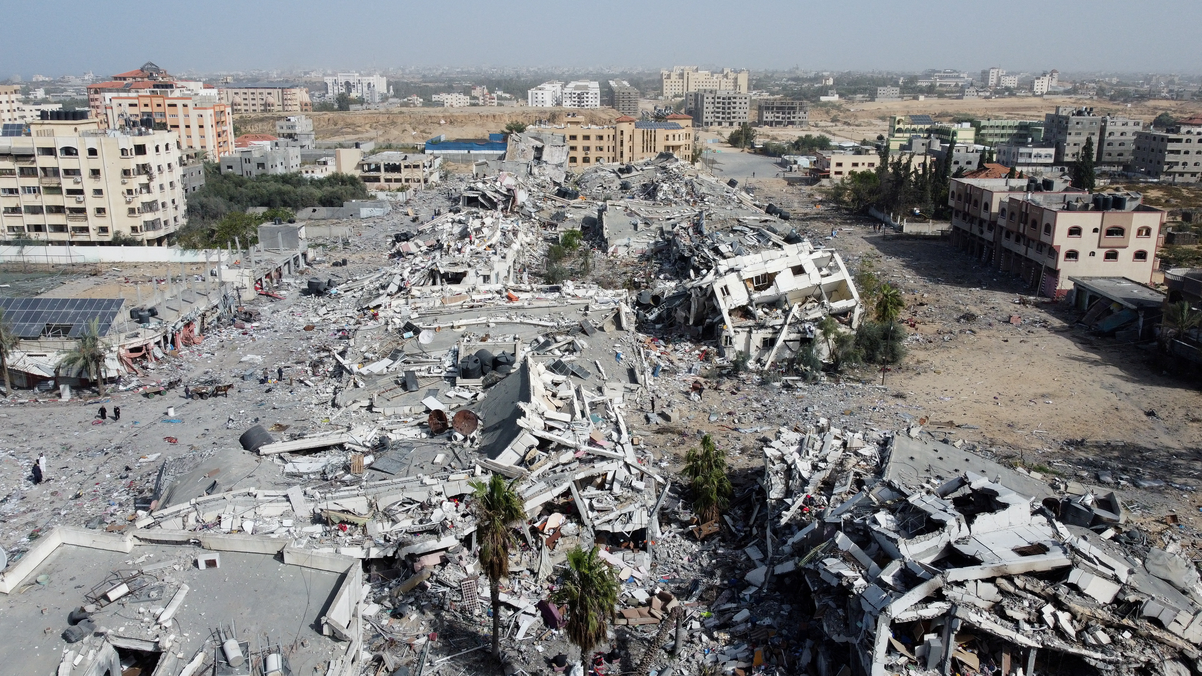 Residential buildings, destroyed in Israeli strikes during the conflict, lie in ruin, in Gaza City