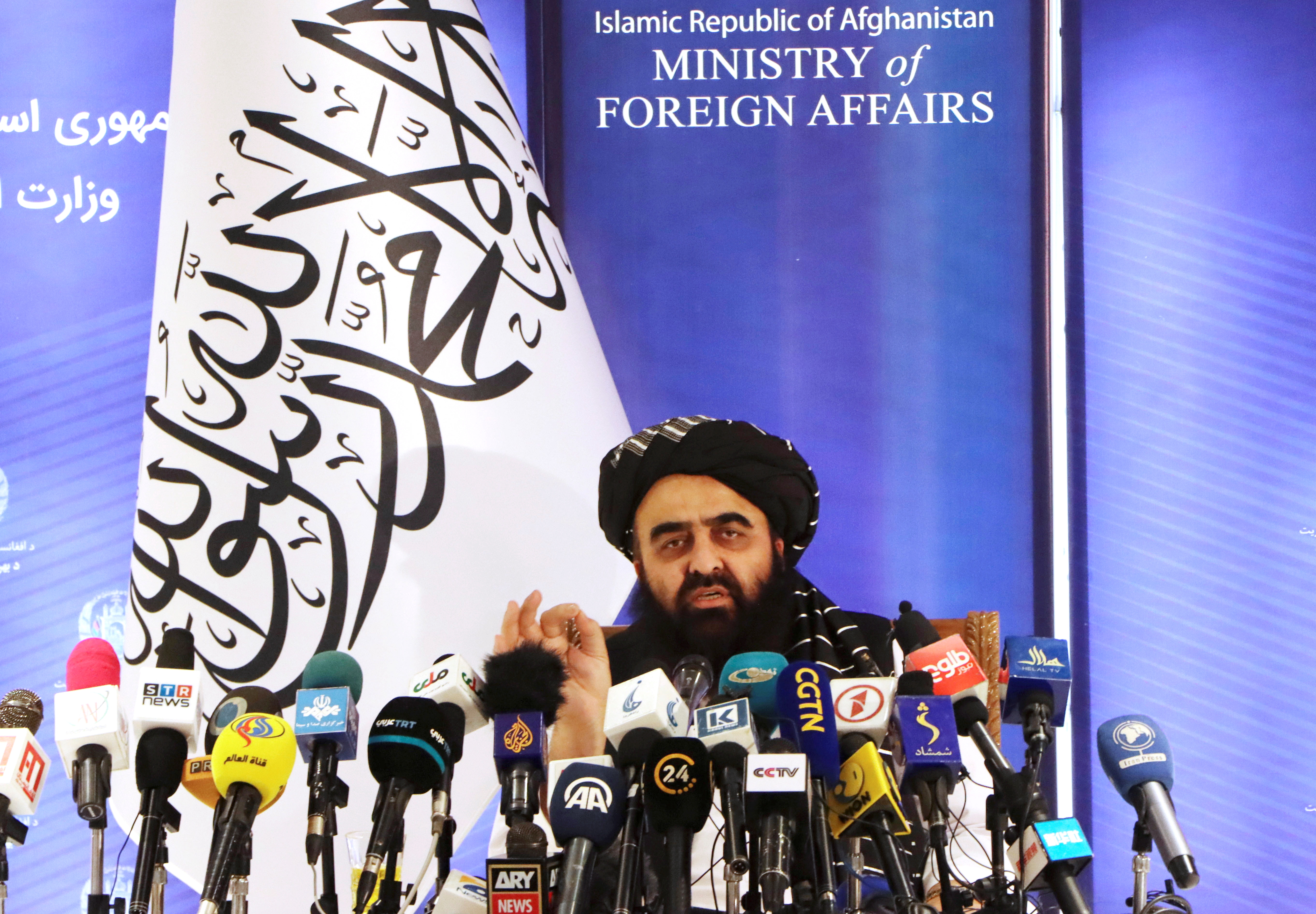 Taliban acting Foreign Minister Amir Khan Muttaqi speaks during a news conference in Kabul