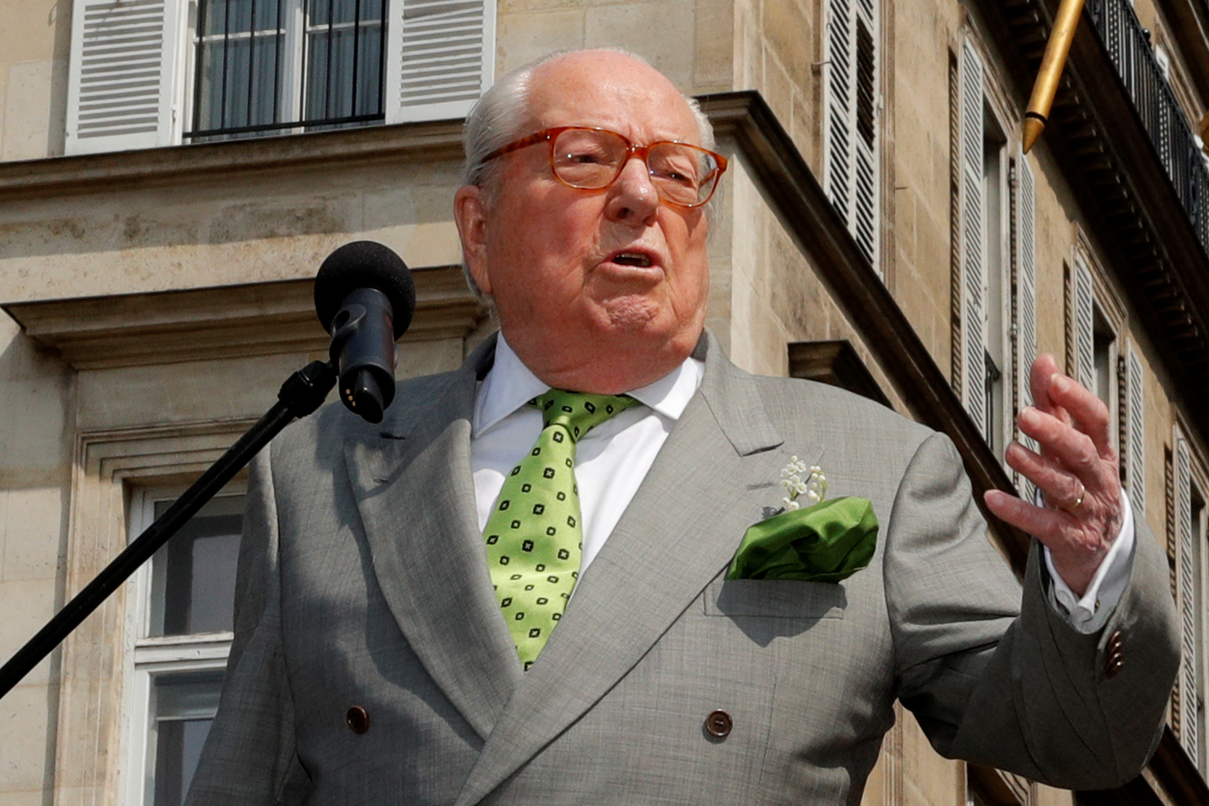 French far-right National Front (FN) founder Jean-Marie Le Pen attends a May Day ceremony in front of the statue of Jeanne d'Arc (Joan of Arc) in Paris