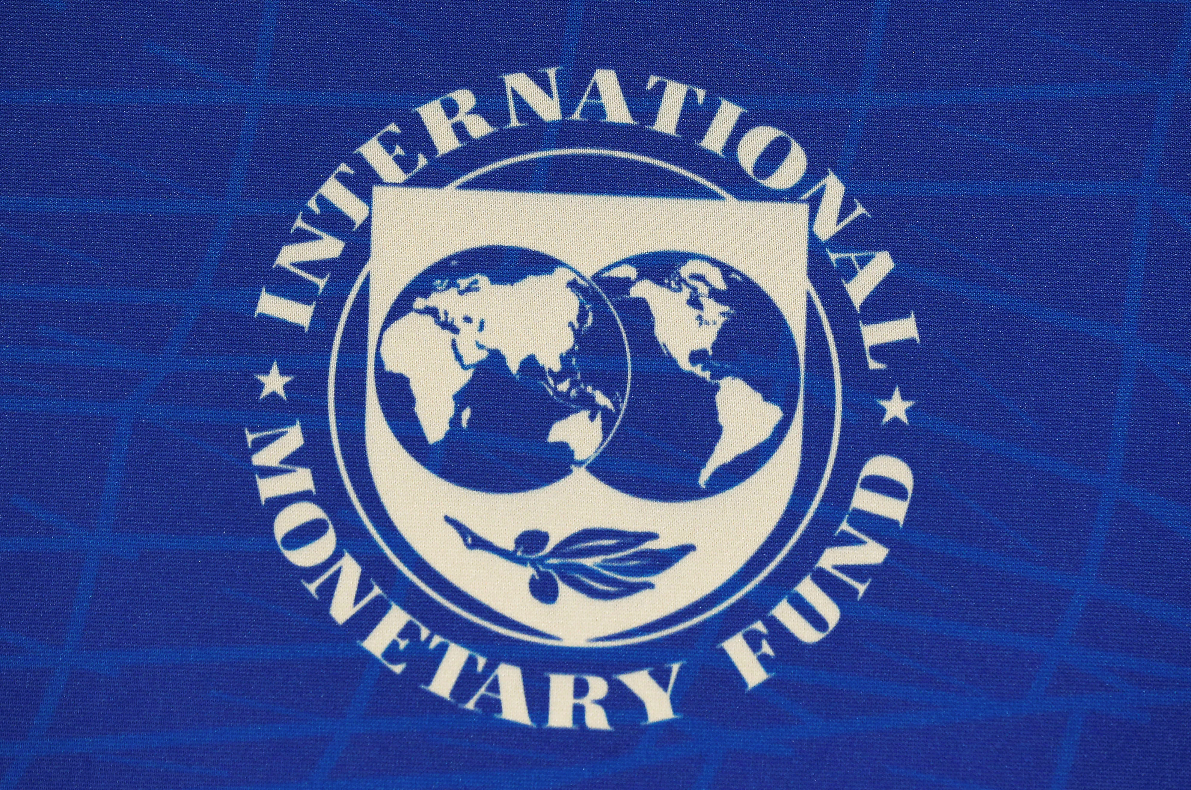 The logo of the International Monetary Fund (IMF), is seen during a news conference in Santiago
