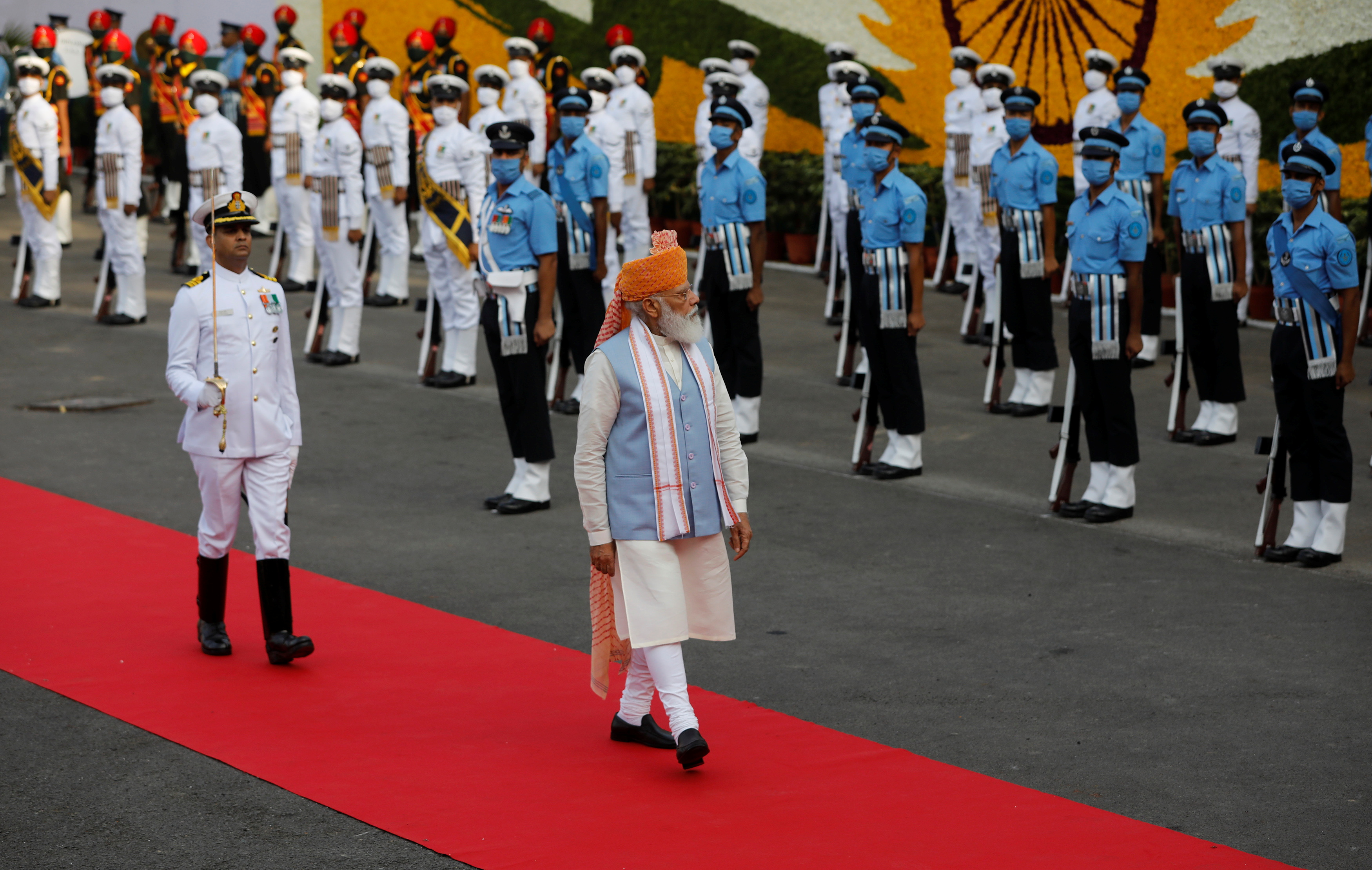 Indian Prime Minister Narendra Modi inspects the honour guard during Independence Day celebrations at the historic Red Fort in Delhi
