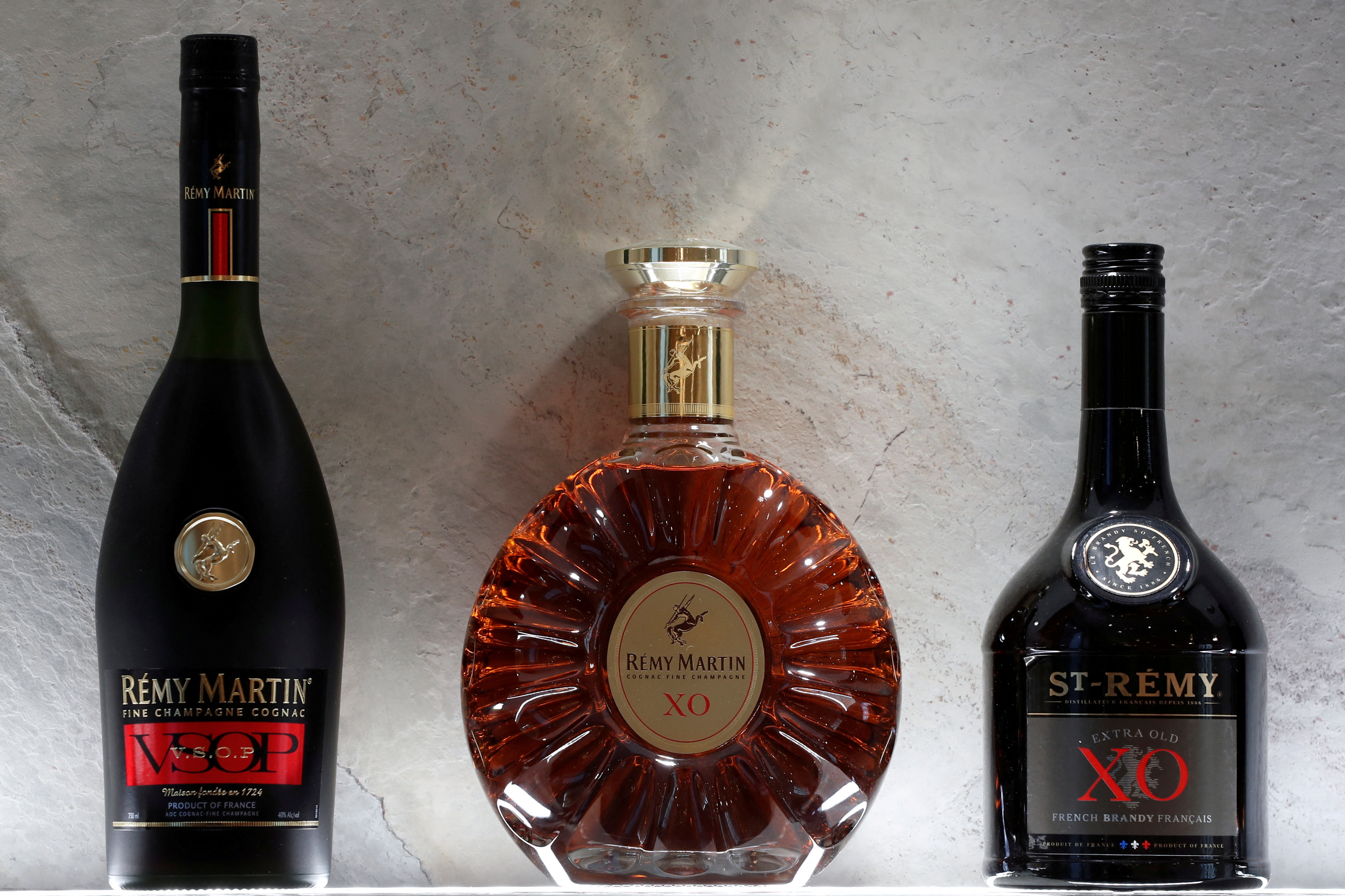 Bottles of Remy Martin VSOP cognac, Remy Martin XO cognac and St-Remy XO Brandy are displayed at the Remy Cointreau SA headquarters in Paris