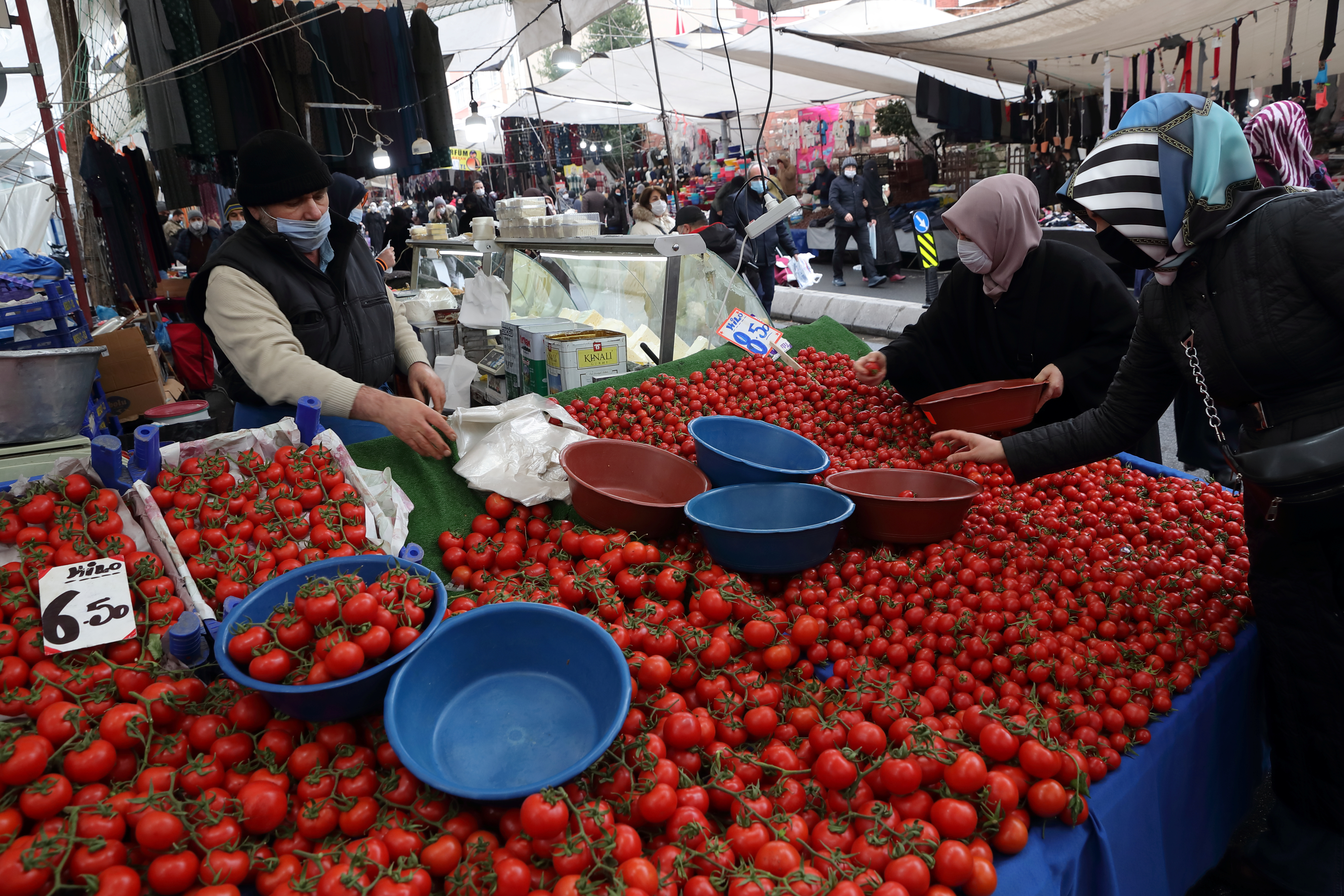 Women shop at a local market in Fatih district in Istanbul, Turkey January 13, 2021. REUTERS/Murad Sezer