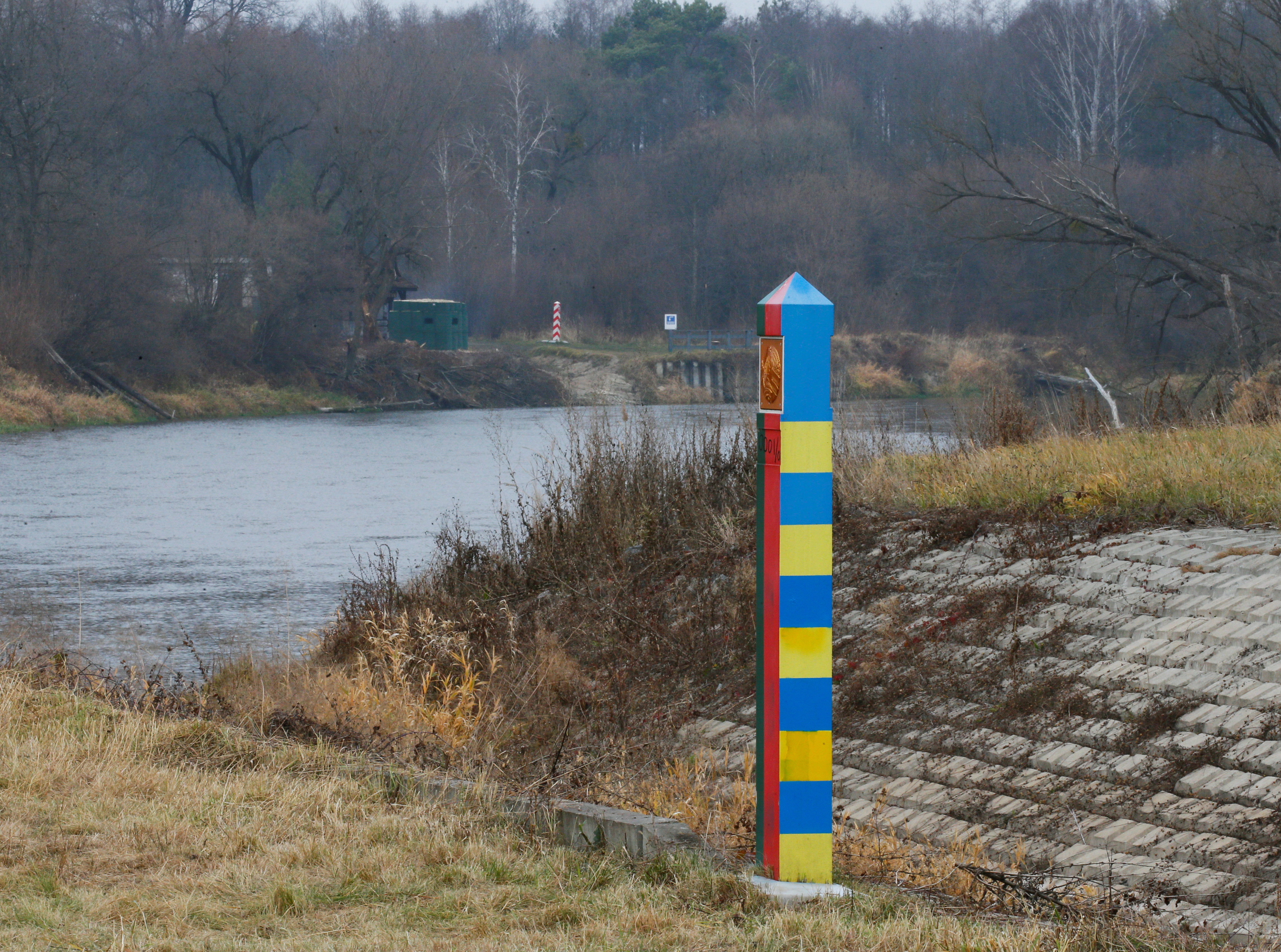 Belarusian-Ukrainian and Polish border sign posts are seen at the border with Belarus and Poland in Volyn region