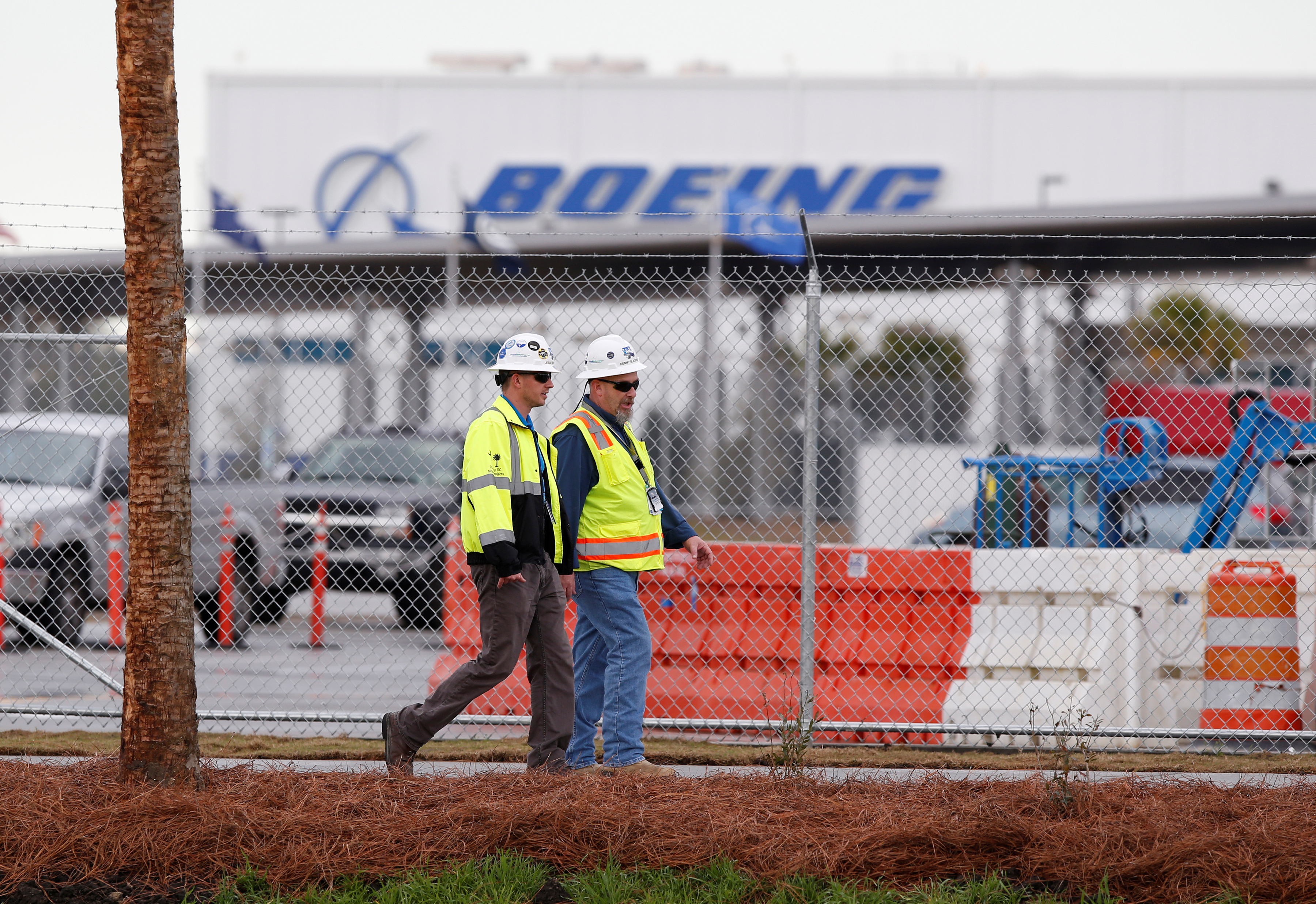 Workers walk through the Boeing South Carolina Plant in North Charleston