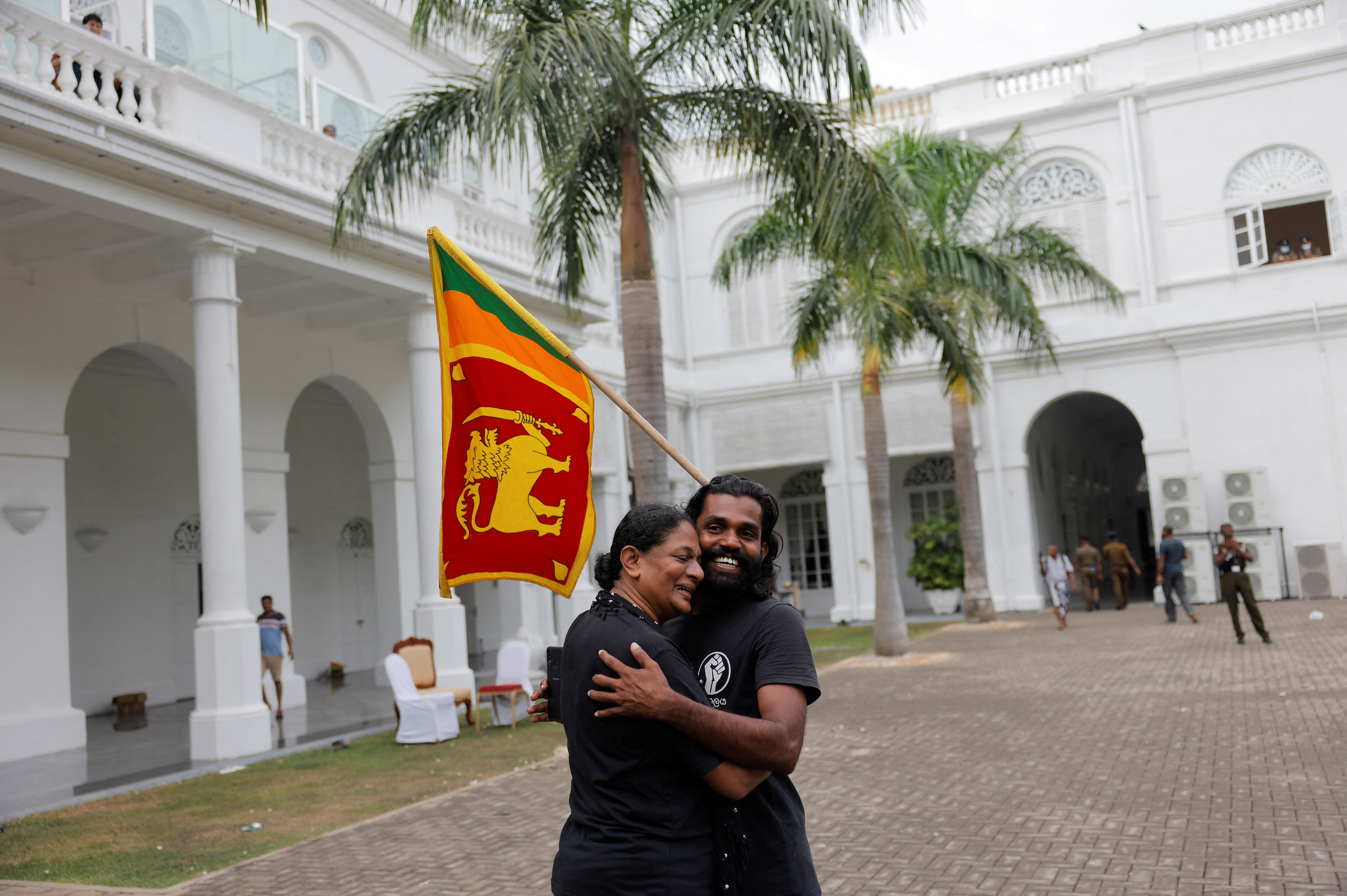 Demonstrators enter the Presidential Secretariat and President's House after Sri Lanka's President Rajapaksa fled, in Colombo