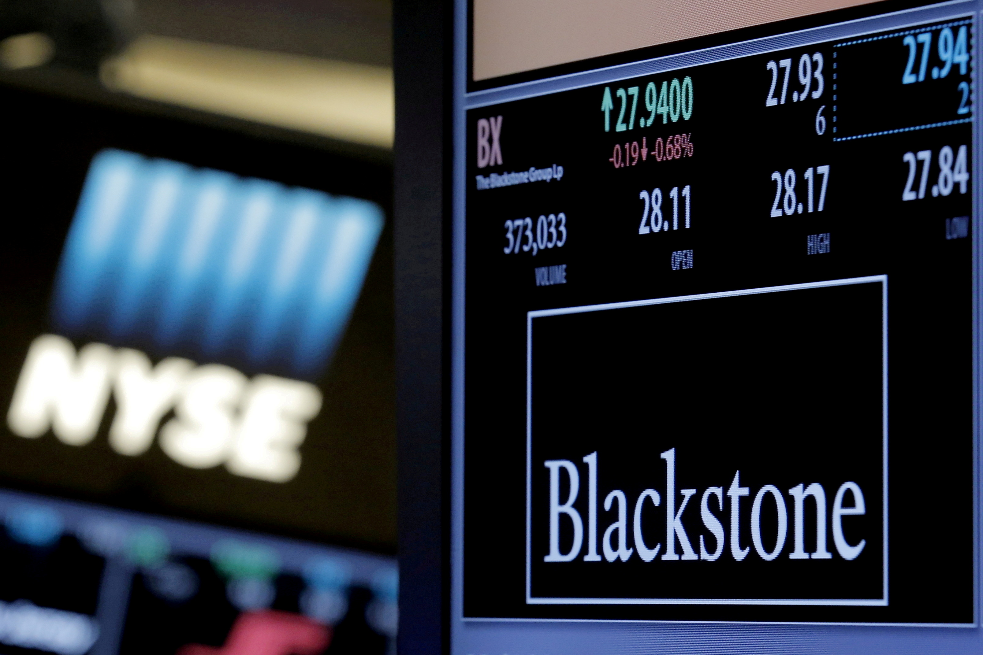 The ticker and trading information for Blackstone Group is displayed at the post where it is traded on the floor of the New York Stock Exchange