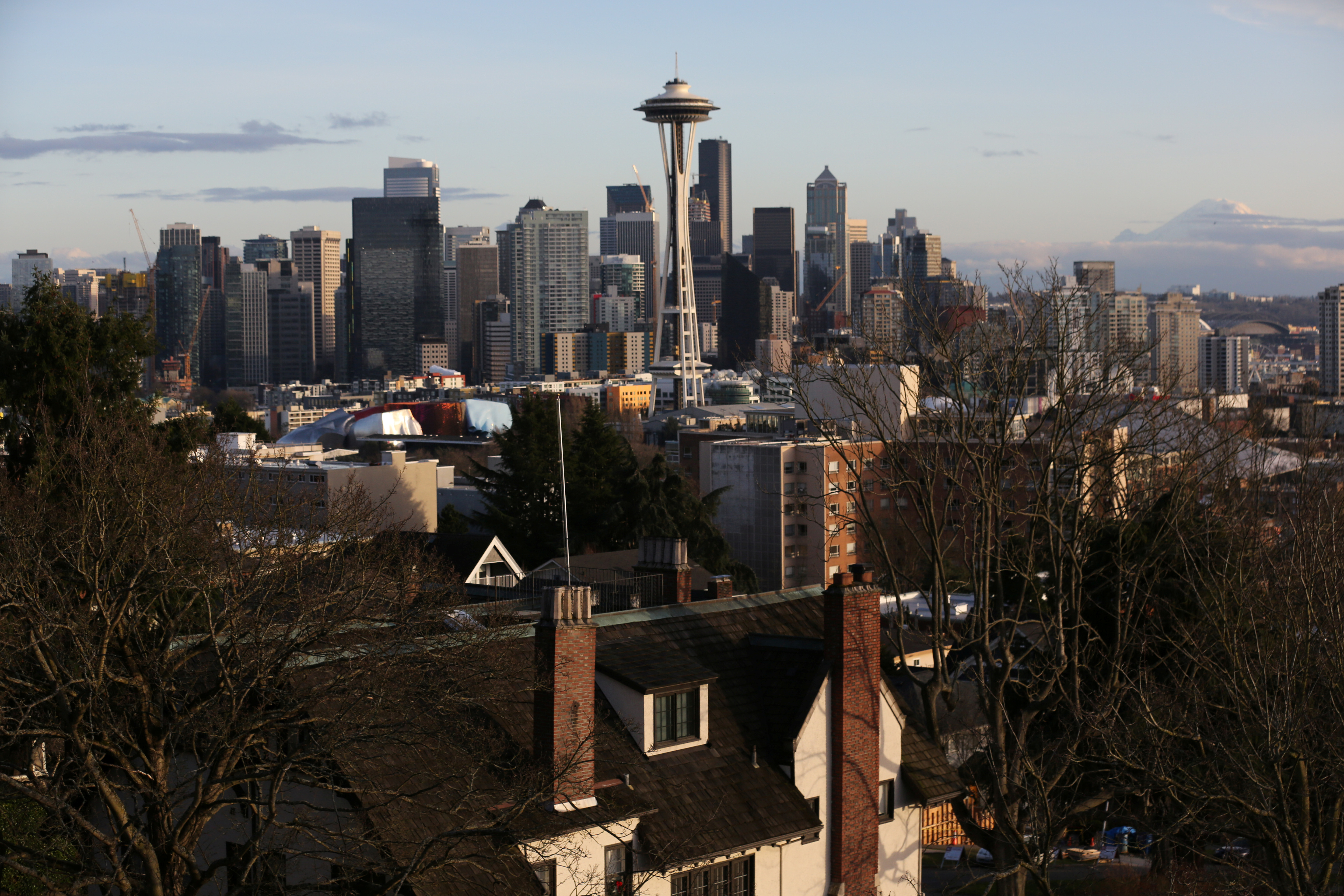 The Space Needle and Mount Rainier are seen on the skyline of Seattle