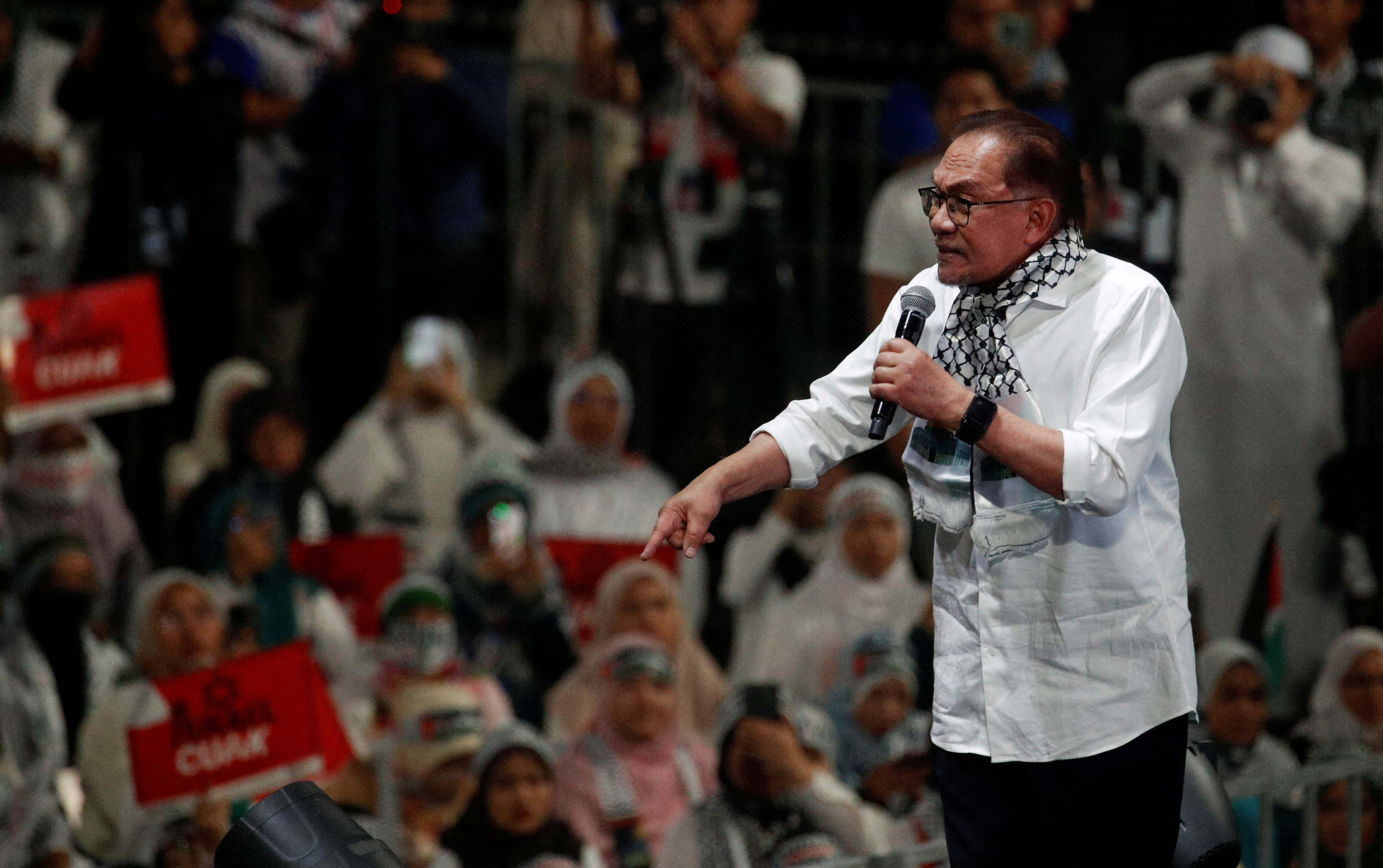 Malaysia Prime Minister Anwar Ibrahim delivers his speech during a solidarity gathering to show support for Palestinians in Kuala Lumpur