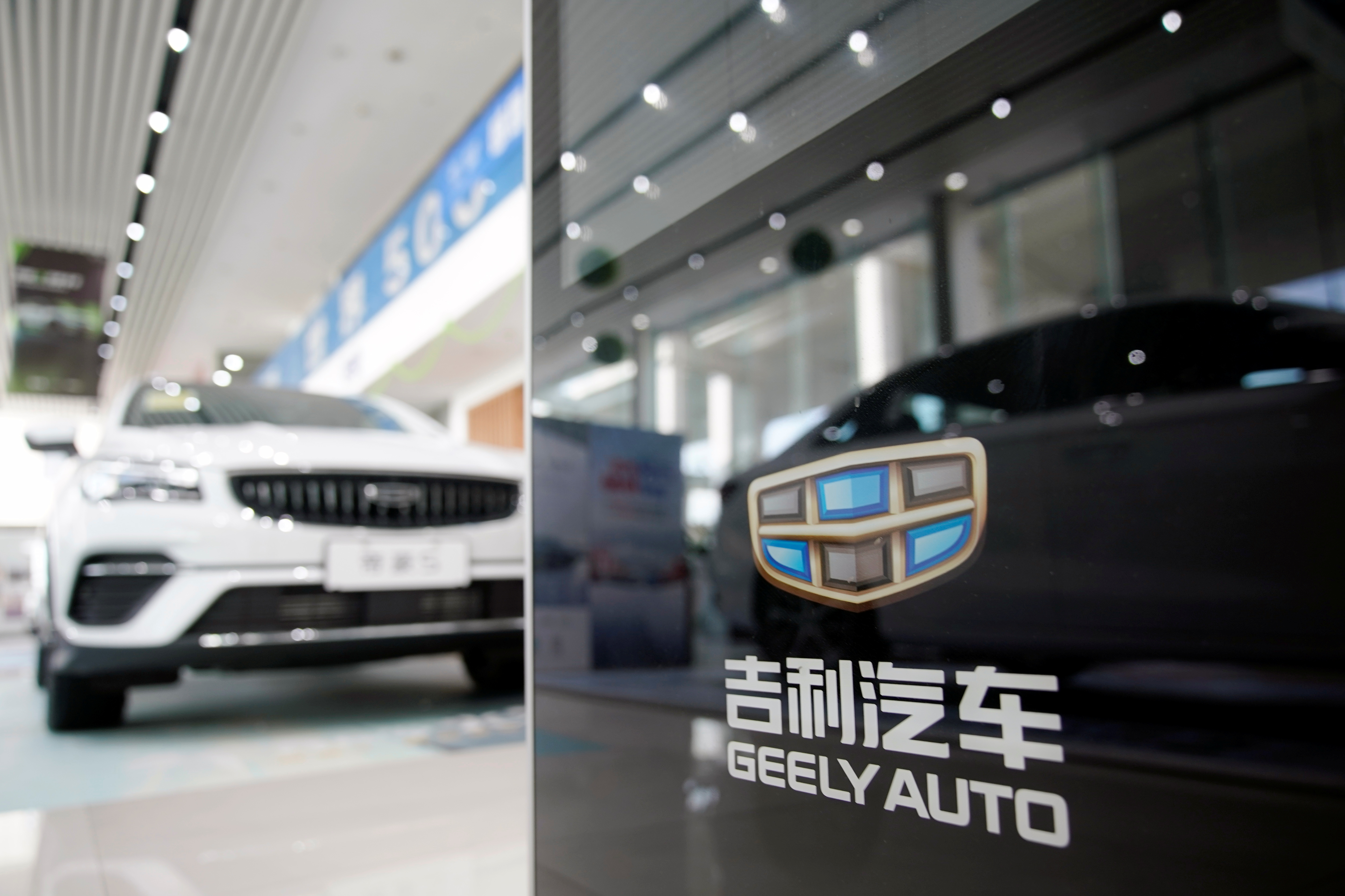 The Geely logo is seen at a car dealership in Shanghai