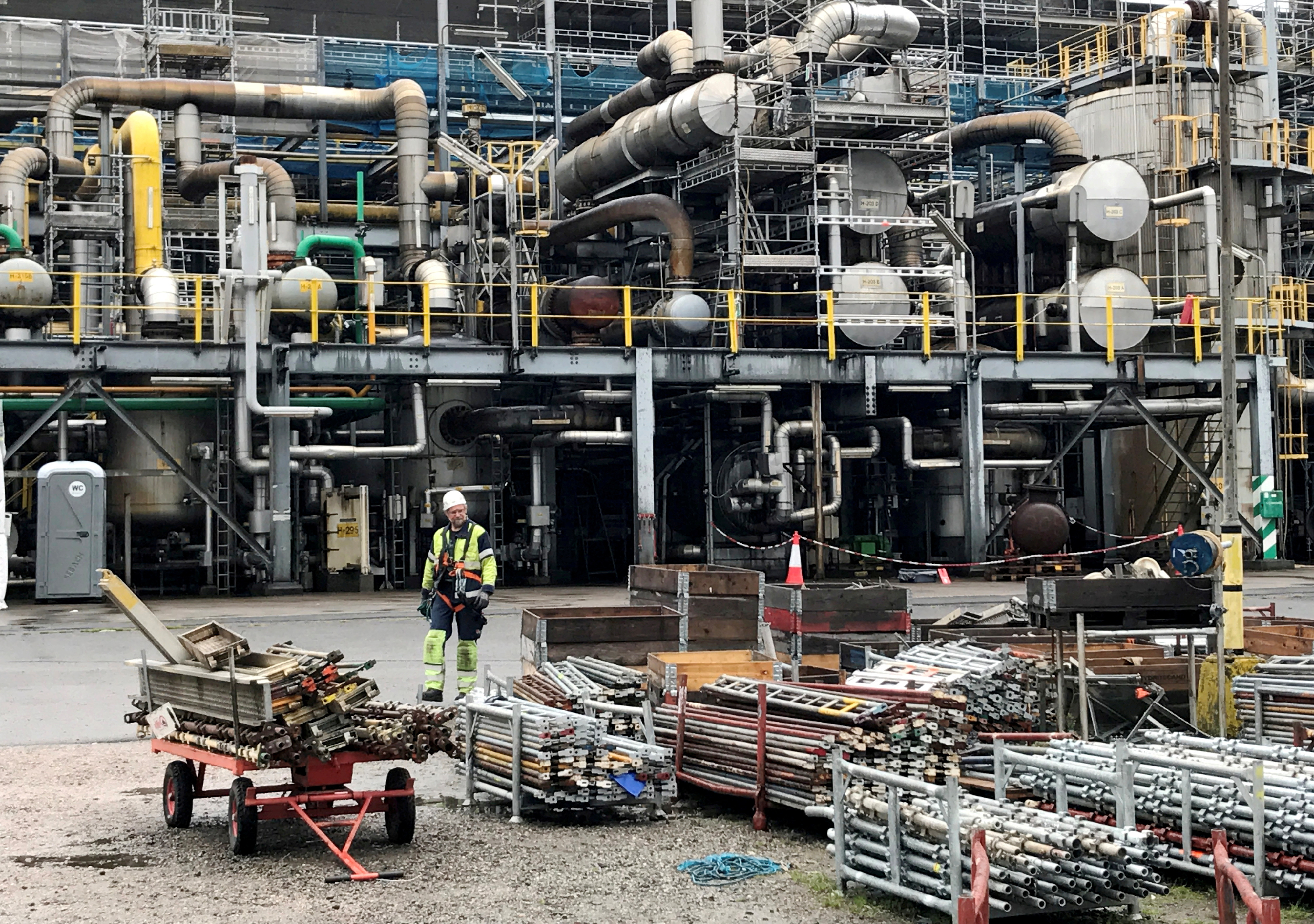 A worker walks at the Yara ammonia plant in Porsgrunn