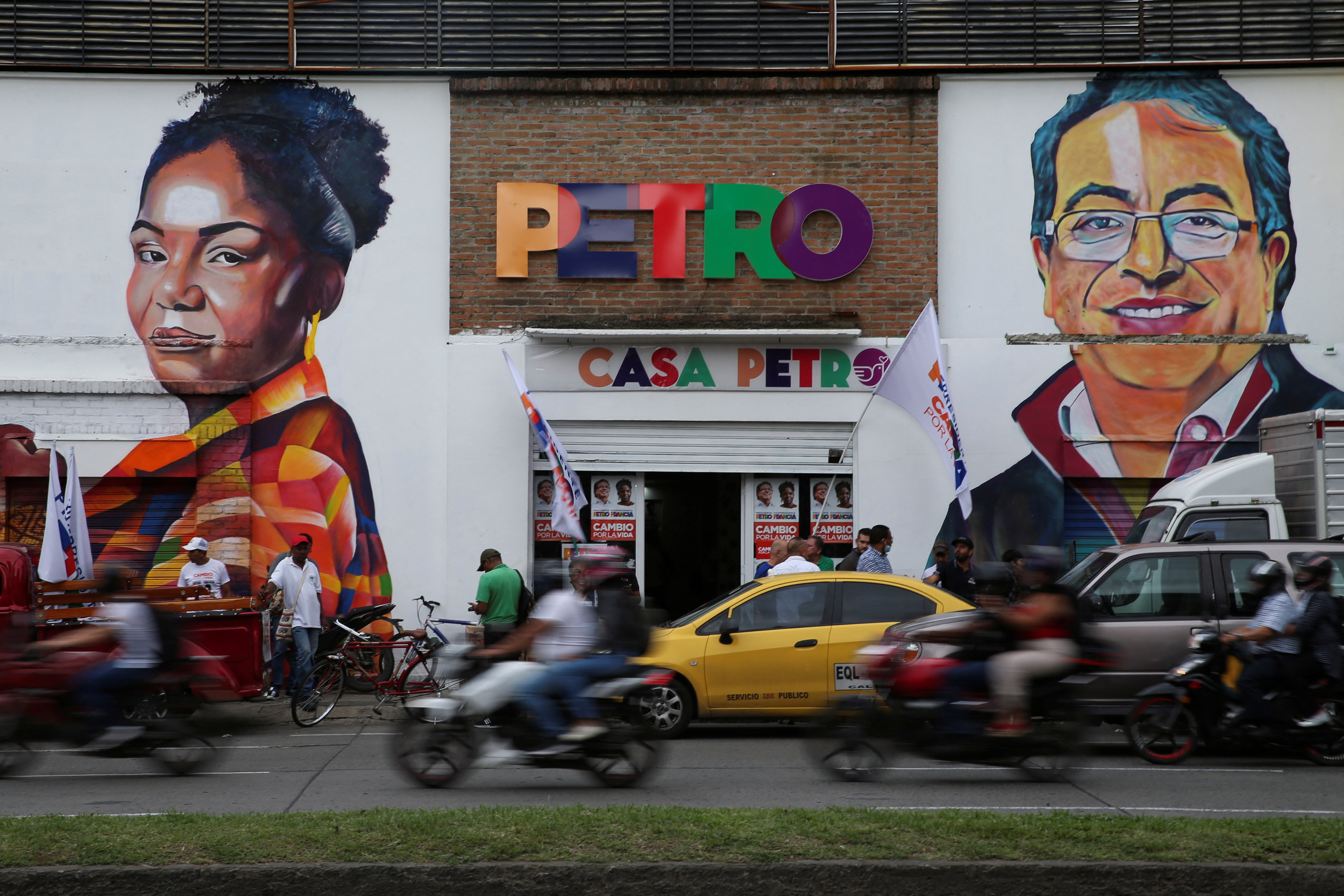 A wall with an image of Colombian left-wing vice-presidential candidate Francia Marquez and Colombian left-wing presidential candidate Gustavo Petro is pictured one day before the first round of the presidential election, in Cali